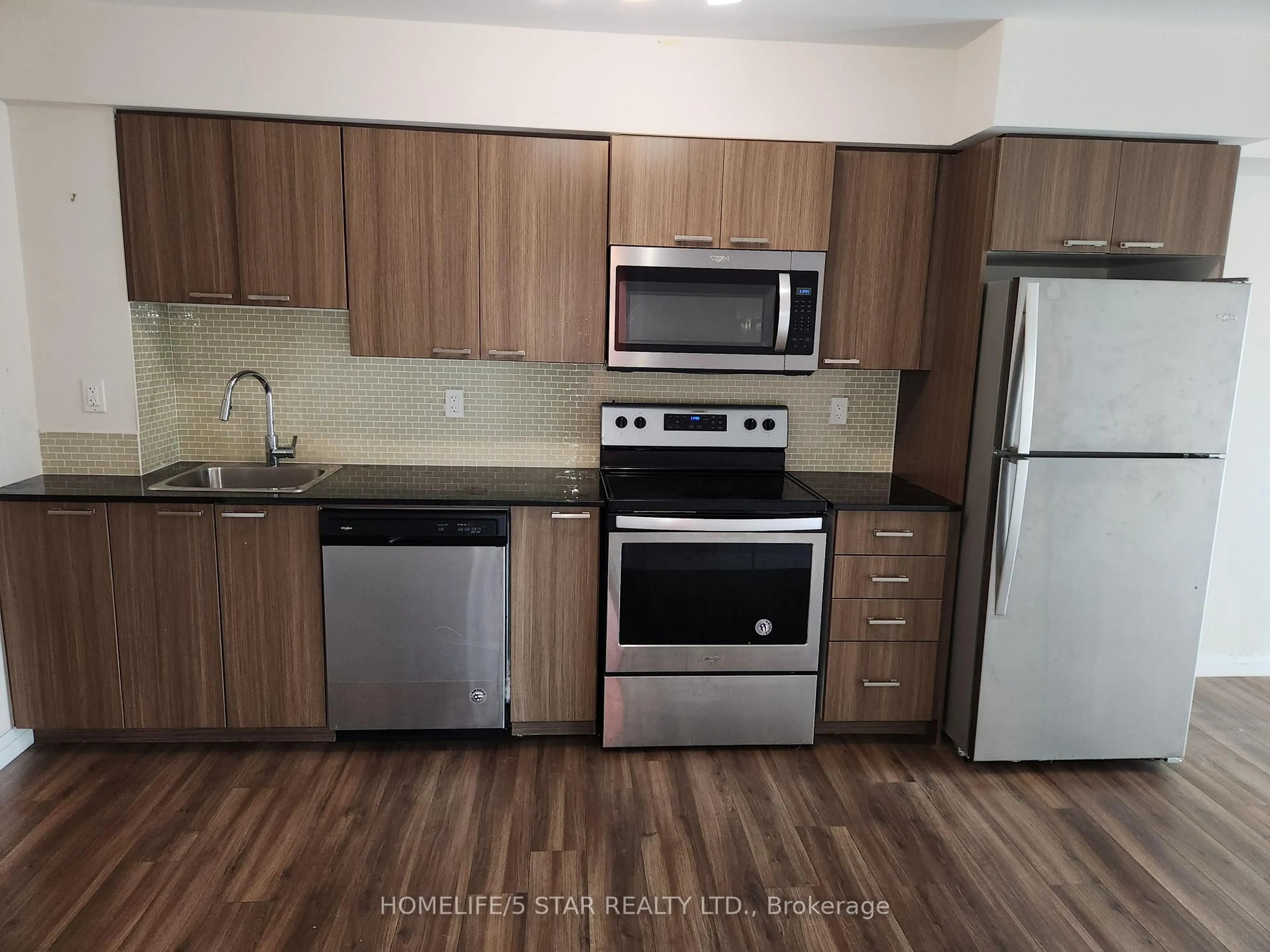 Standard kitchen, wood/laminate floor for 2150 Lawrence Ave #312, Toronto Ontario M1R 3A7