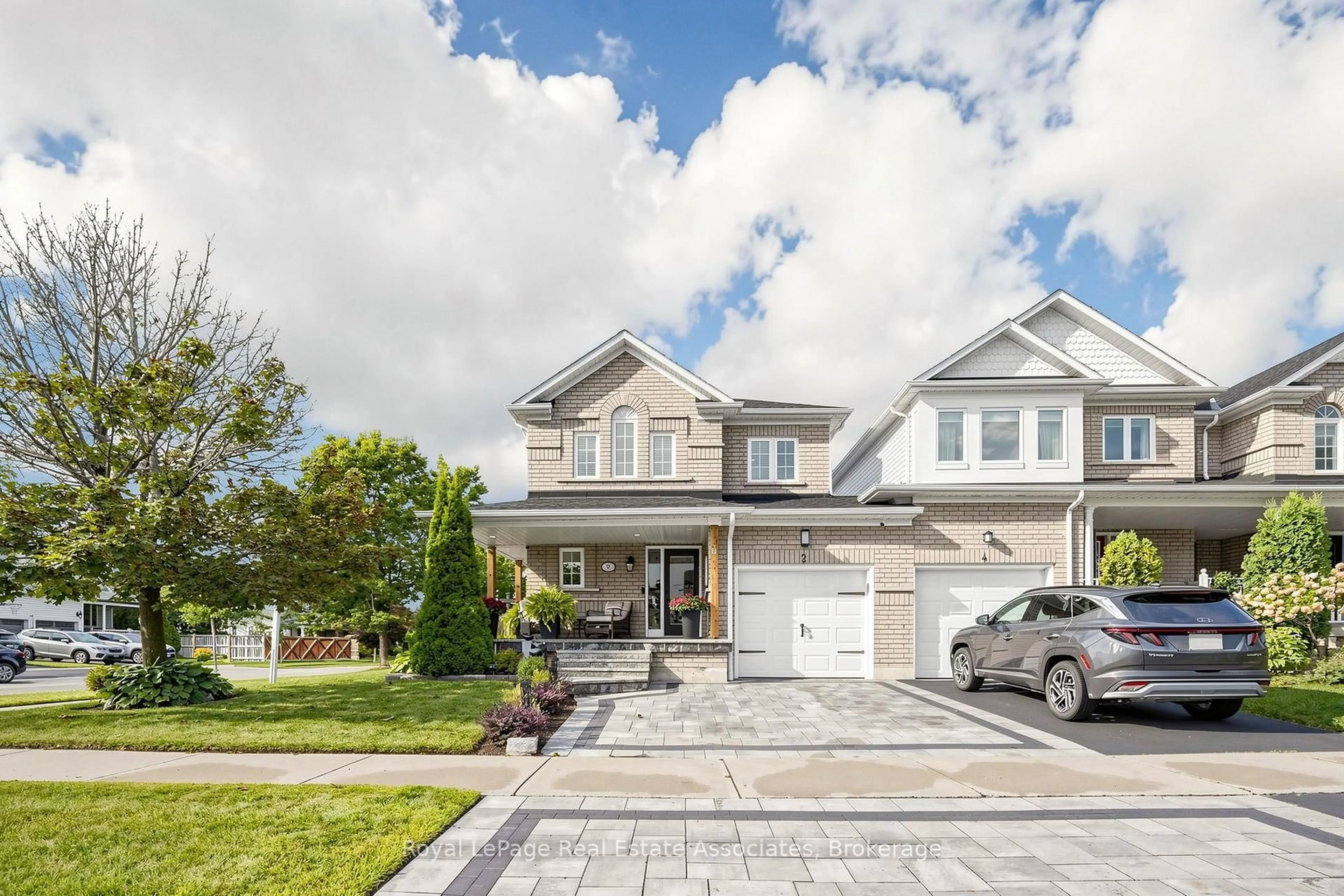 Home with brick exterior material, street for 2 Primeau Ave, Whitby Ontario L1M 2B7
