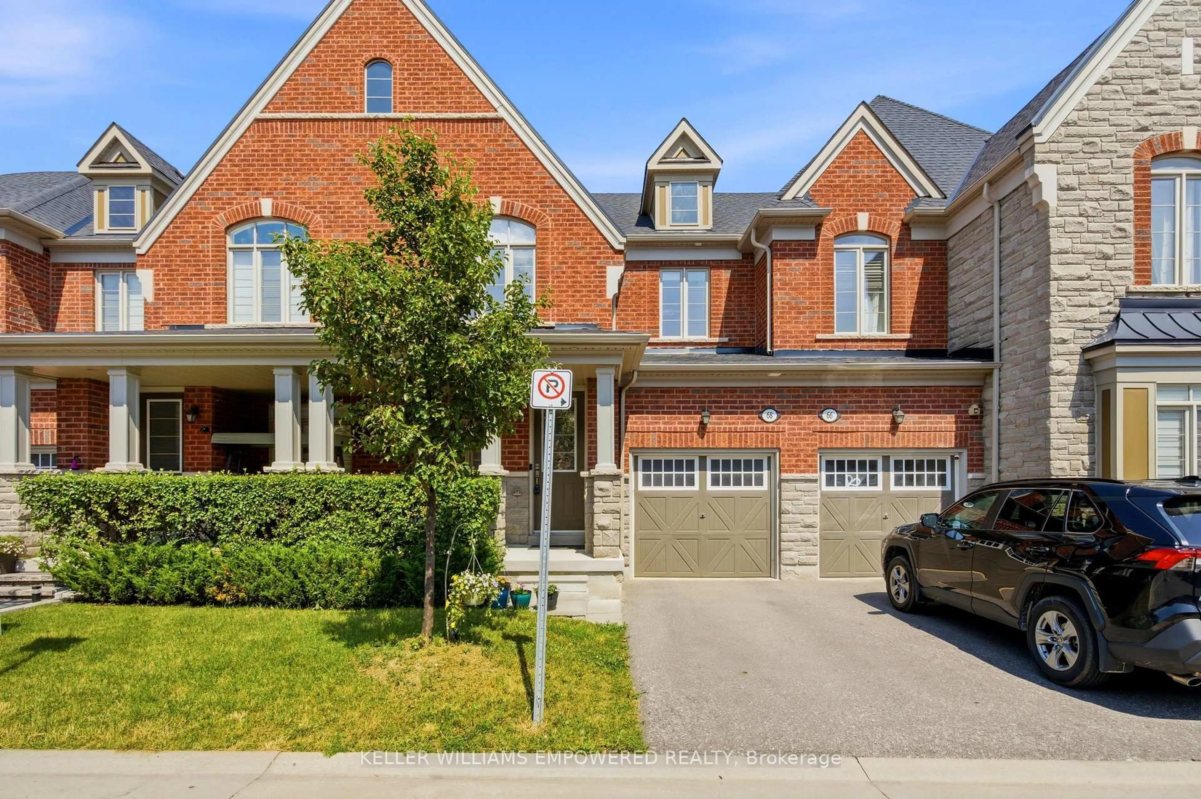 Home with brick exterior material, street for 68 Workmens Circ, Ajax Ontario L1T 0N7
