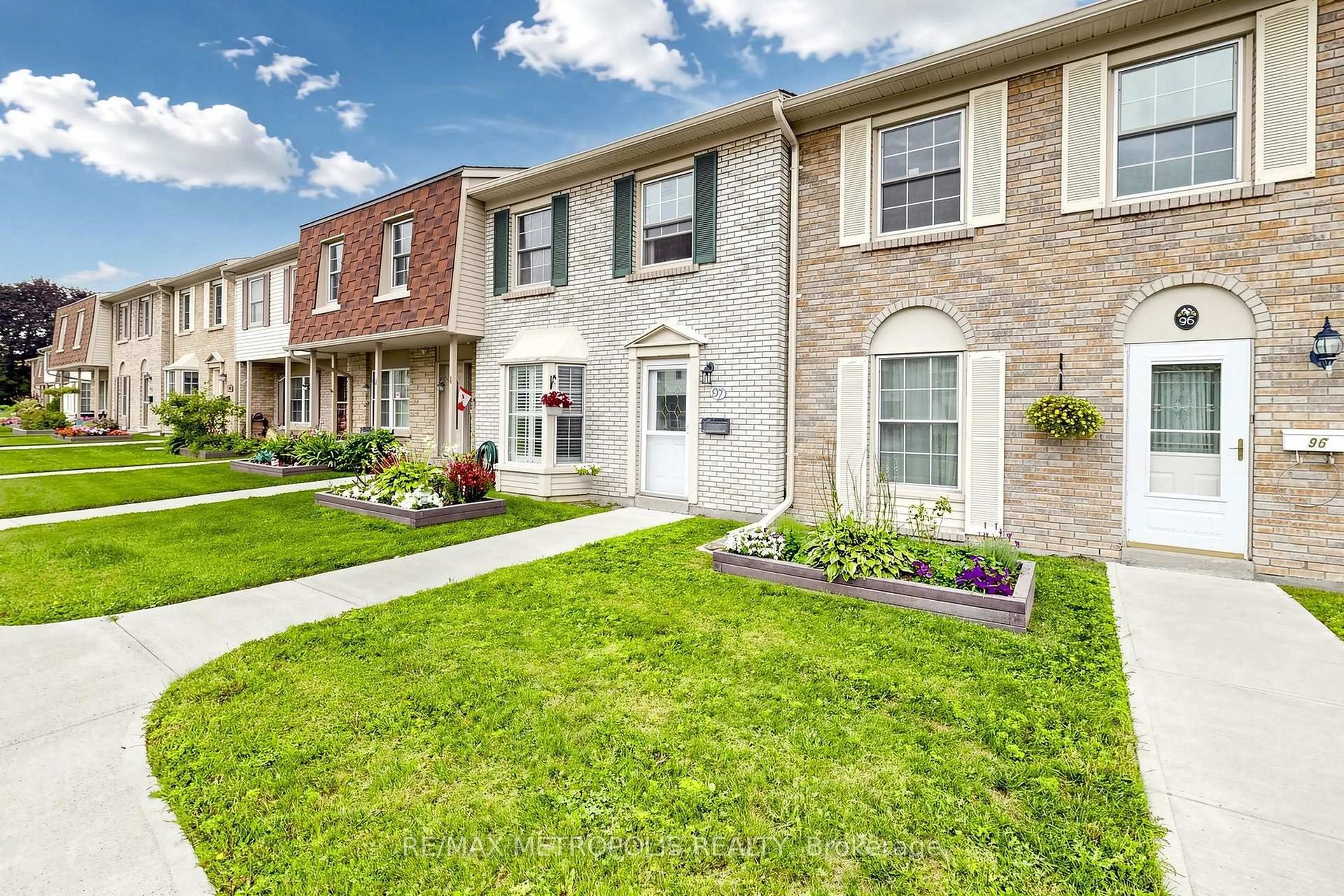 Home with brick exterior material, street for 580 Eyer Dr #96, Pickering Ontario L1W 3B7