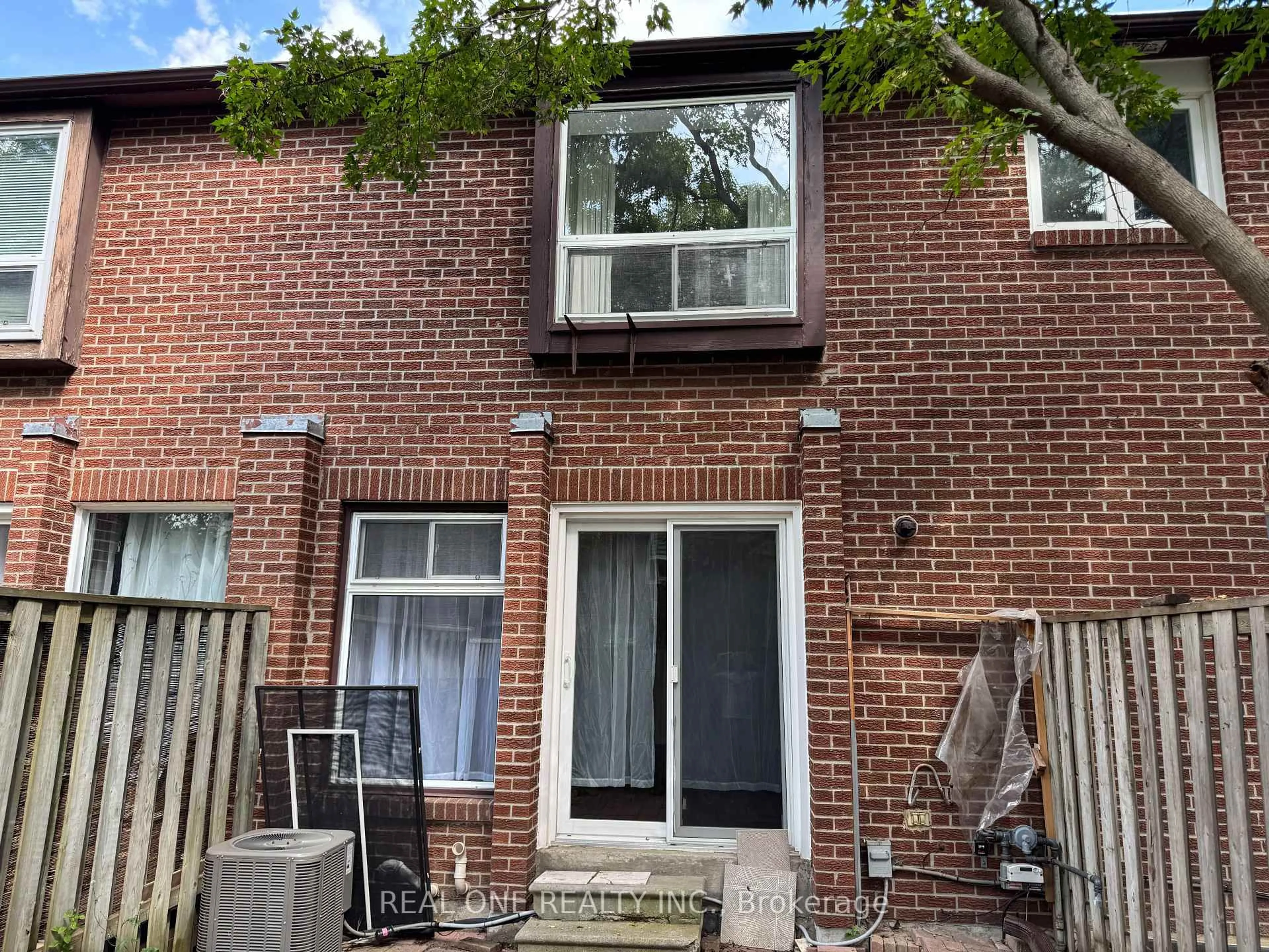 Home with brick exterior material, street for 72 Dusay Pl #16, Toronto Ontario M1W 2N2