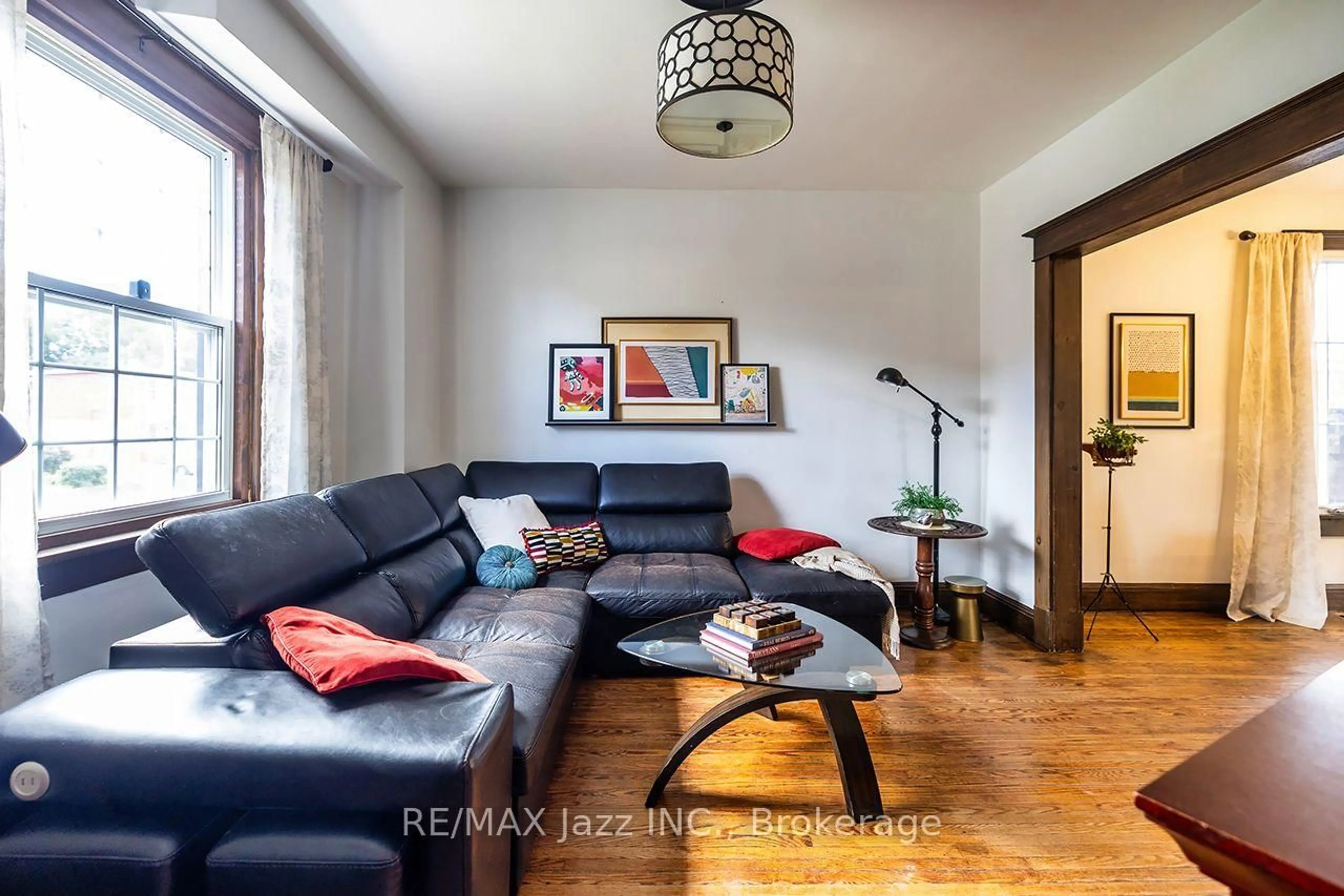Living room with furniture, wood/laminate floor for 180 Olive Ave, Oshawa Ontario L1H 2P2