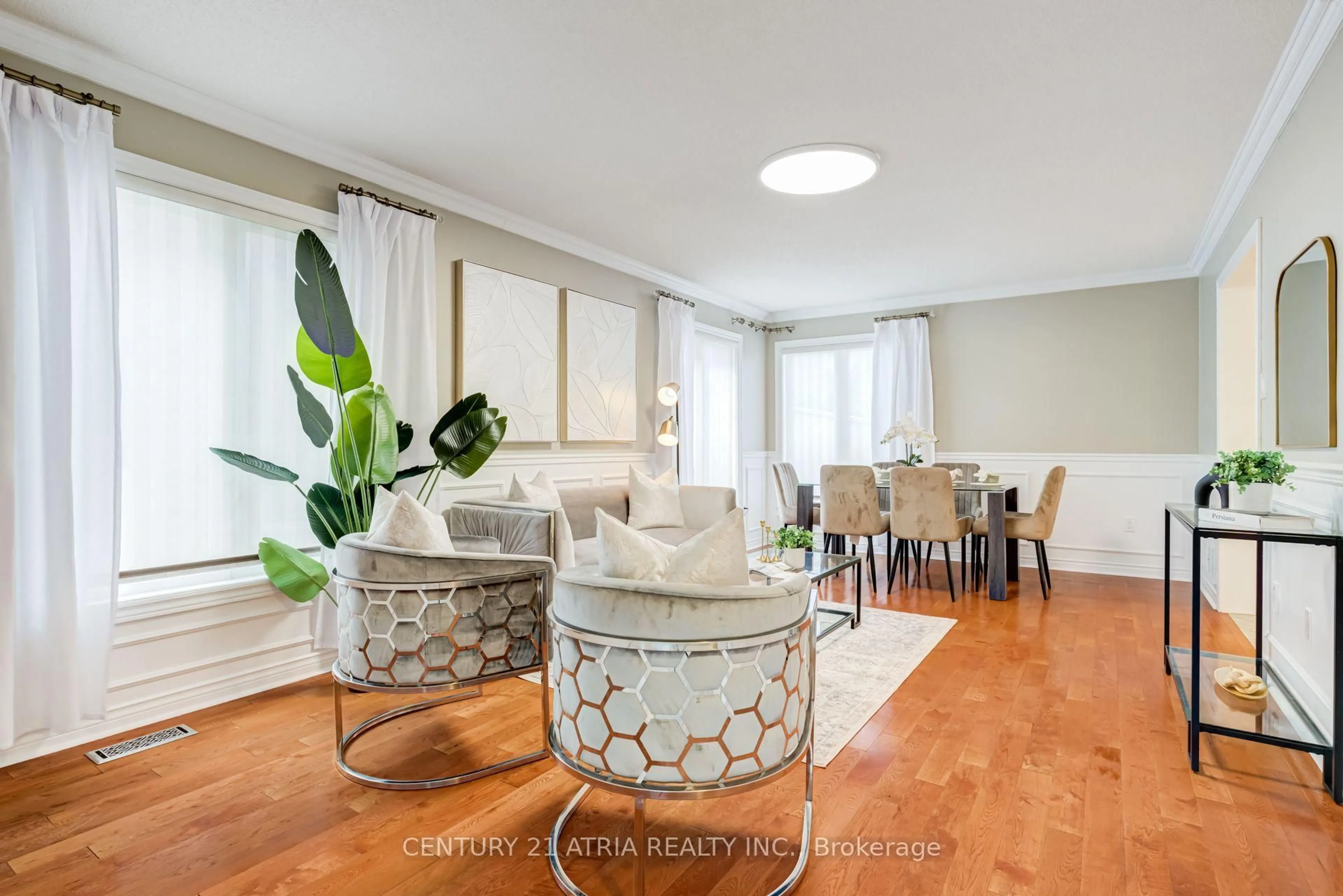 Living room with furniture, wood/laminate floor for 14 Robert Attersley Dr, Whitby Ontario L1R 3E3