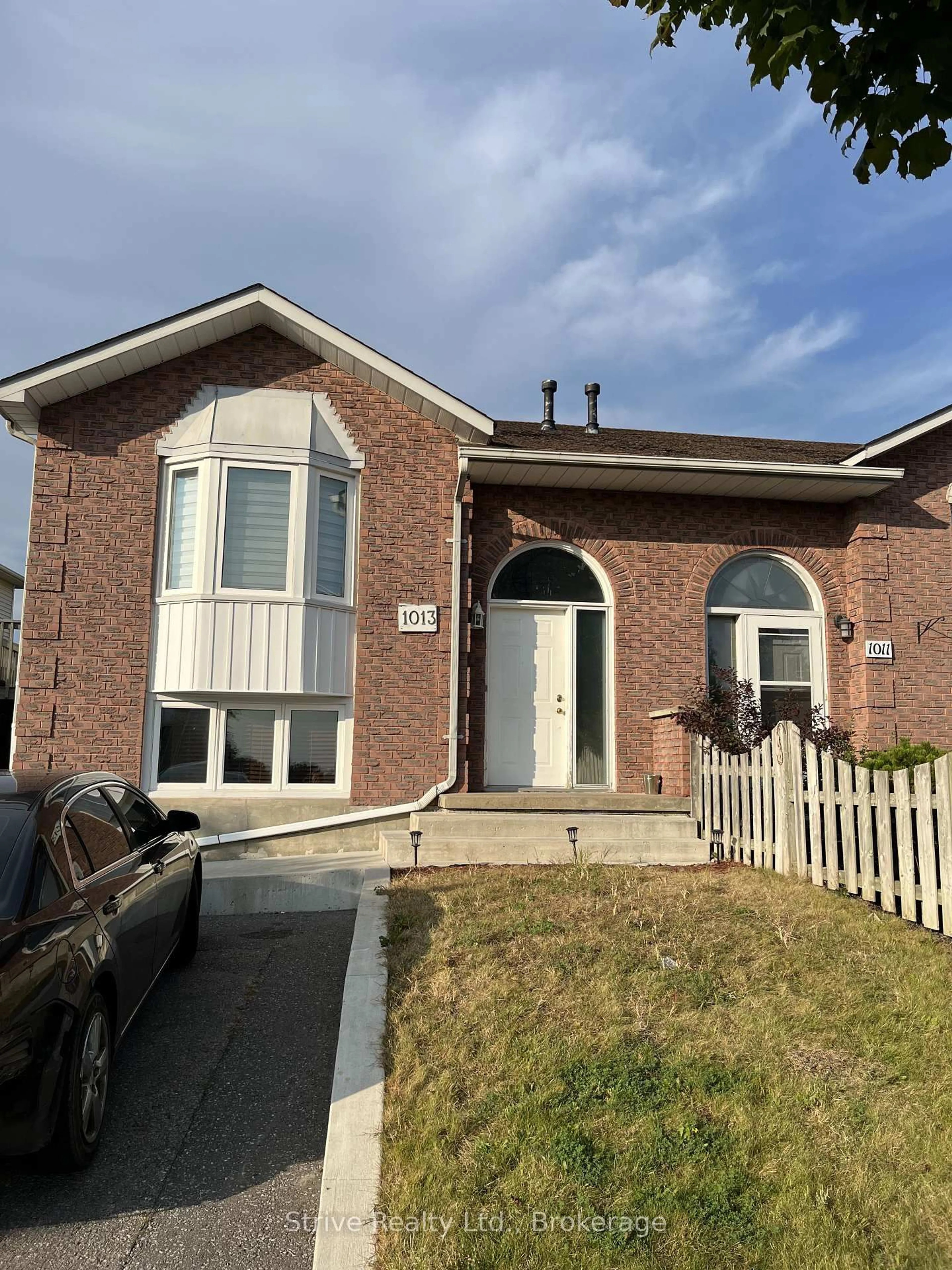 Home with brick exterior material, street for 1013 Attersley Dr, Oshawa Ontario L1K 2G9