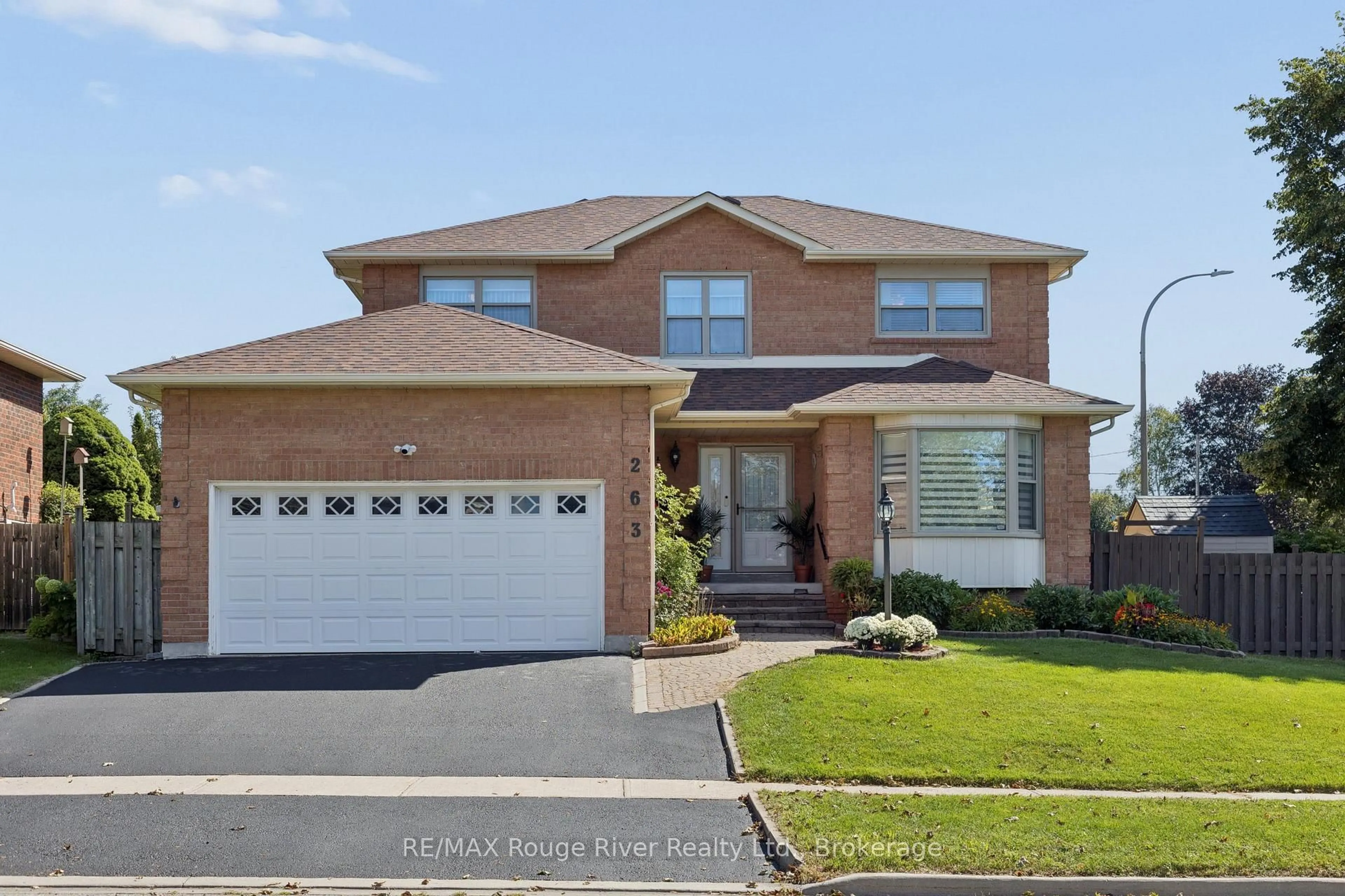 Home with brick exterior material, street for 263 Glen Hill Dr, Whitby Ontario L1N 7J5