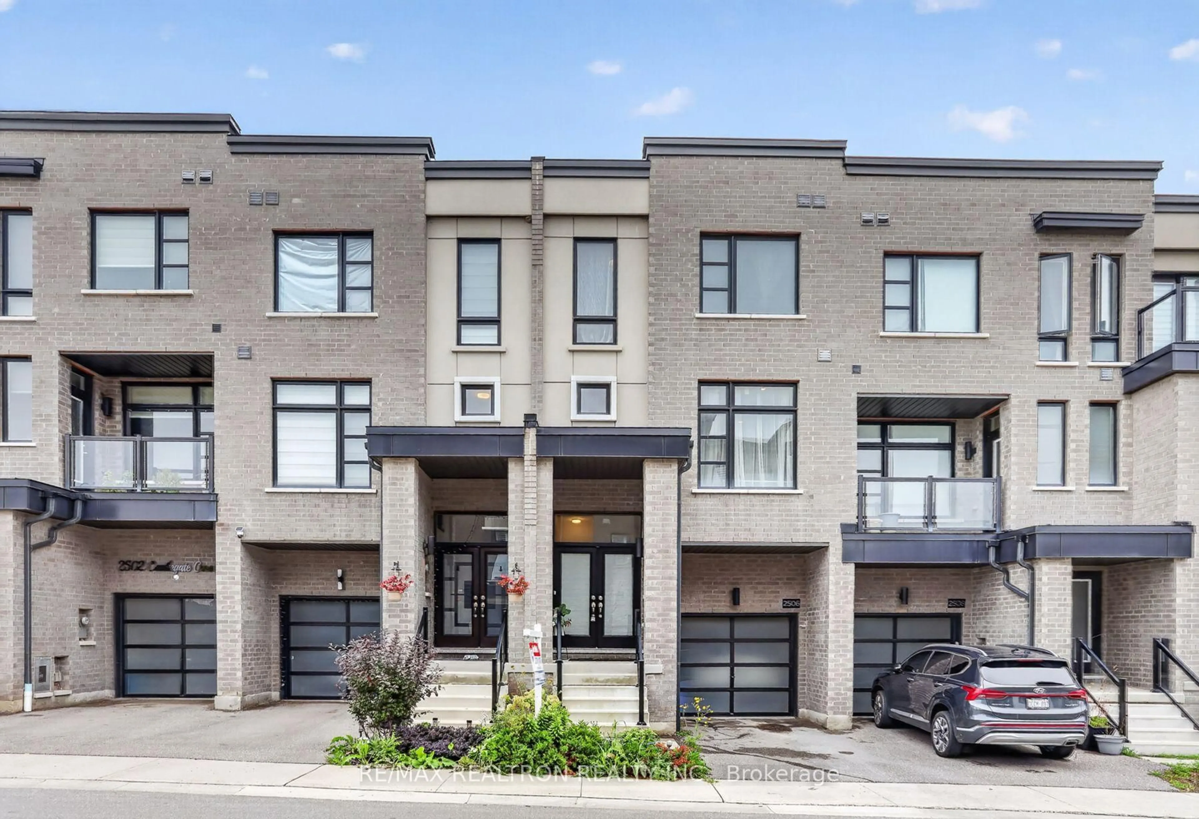 Home with brick exterior material, street for 2506 Castlegate Crossing Dr, Pickering Ontario L1X 0H8