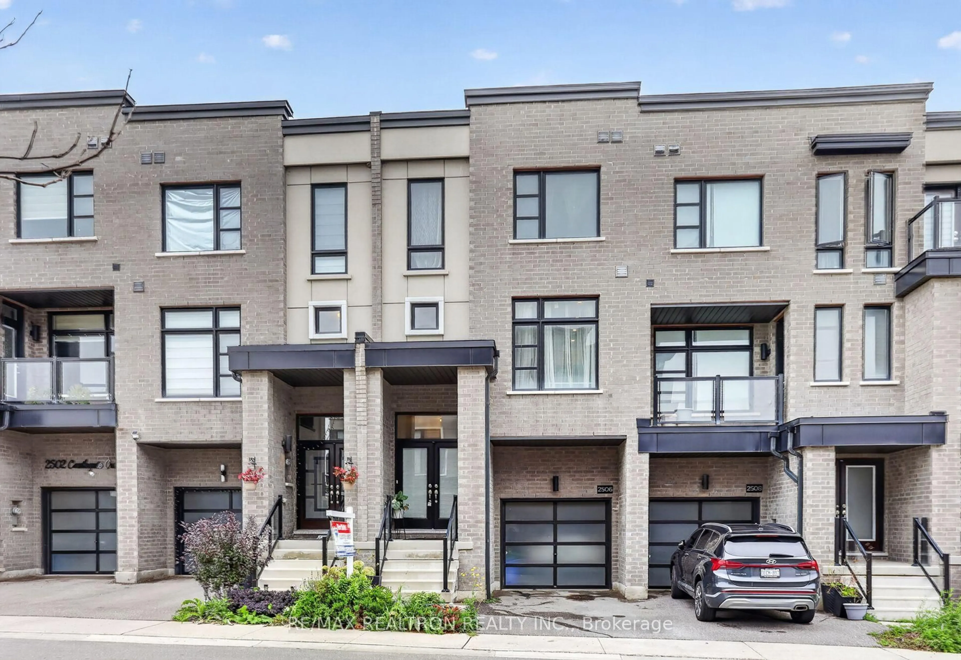 Home with brick exterior material, street for 2506 Castlegate Crossing Dr, Pickering Ontario L1X 0H8
