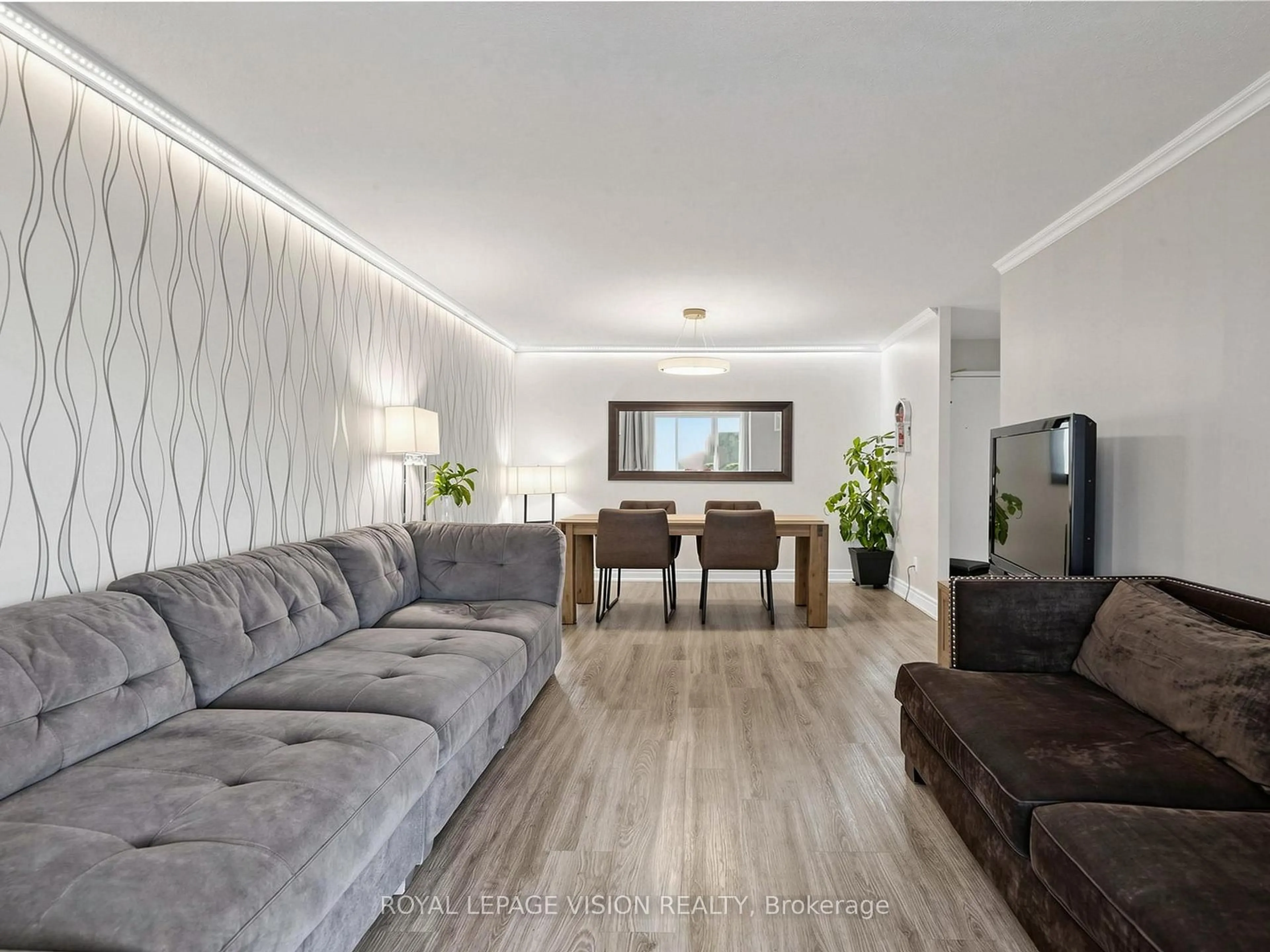 Living room with furniture, wood/laminate floor for 11753 Sheppard Ave #419, Toronto Ontario M1B 5M3