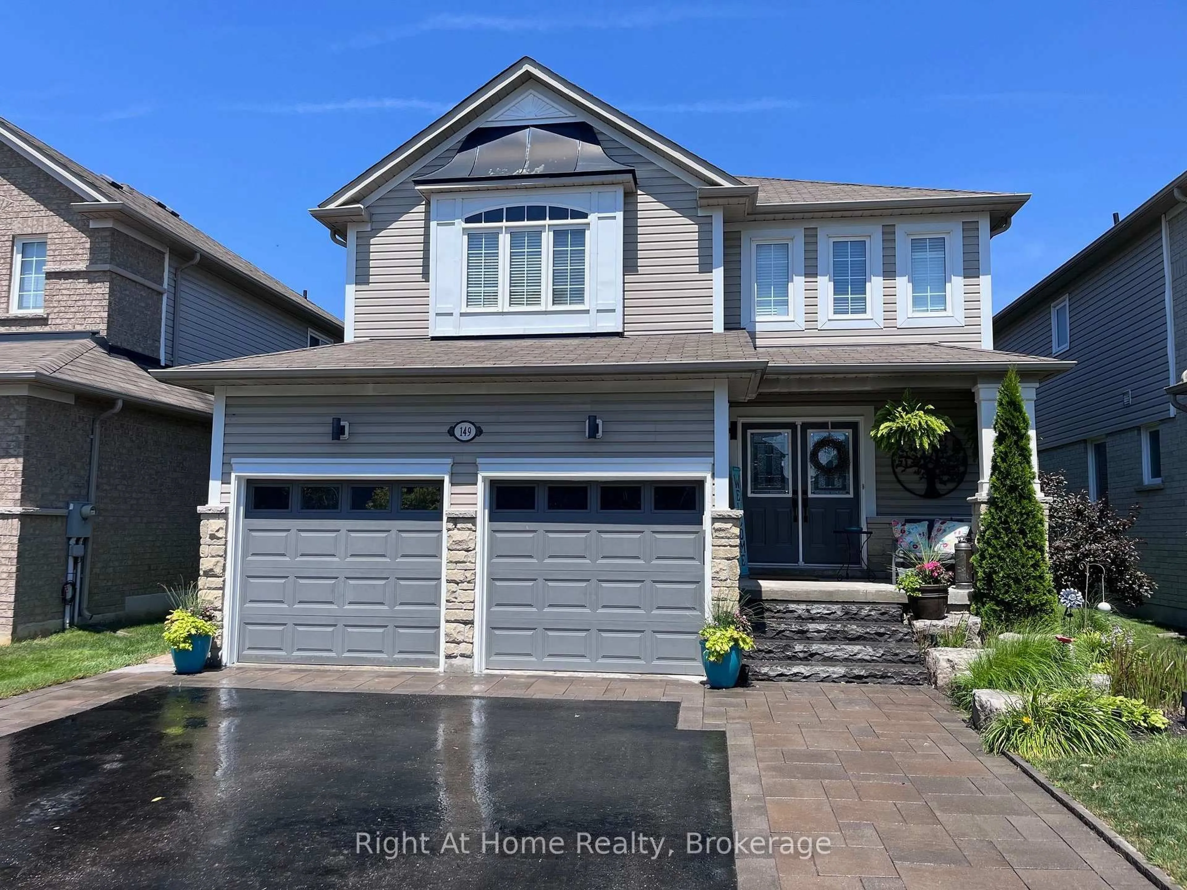 Home with vinyl exterior material, street for 149 Dadson Dr, Clarington Ontario L1C 5M7