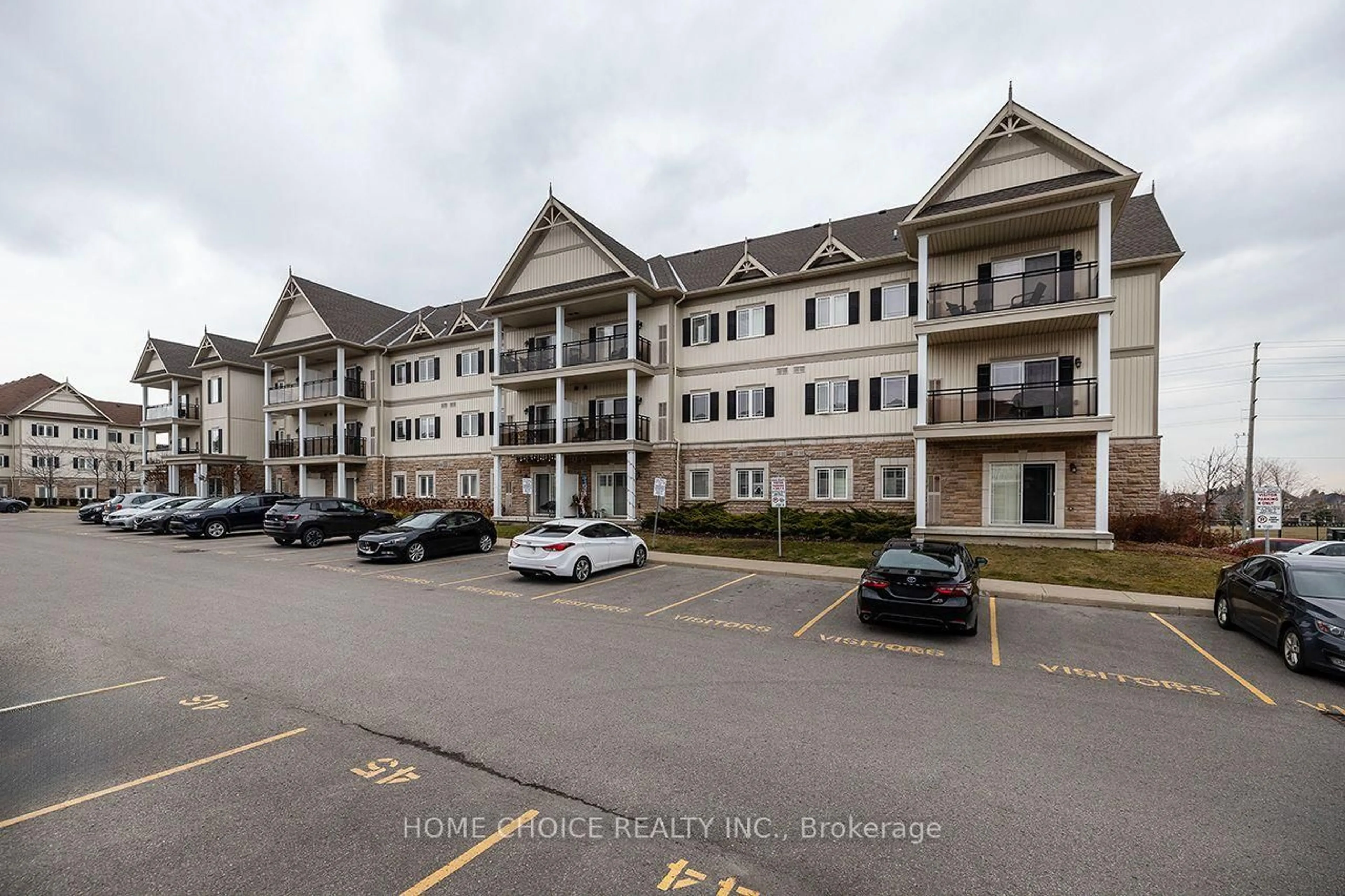 A pic from outside/outdoor area/front of a property/back of a property/a pic from drone, building for 1 Sidney Lane #105, Clarington Ontario L1C 0N5