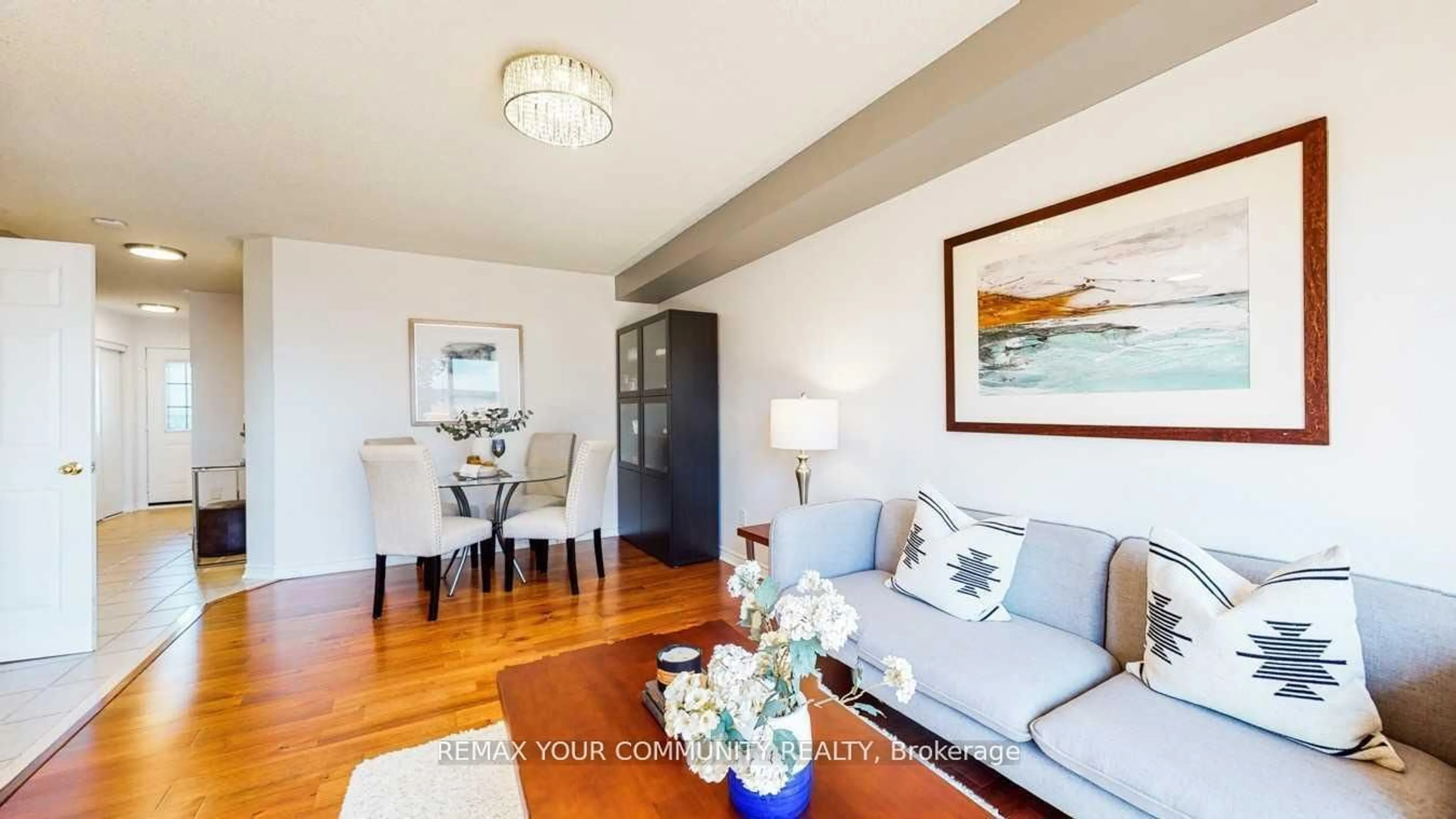 Living room with furniture, wood/laminate floor for 143 Cornish Dr, Clarington Ontario L1E 3G9