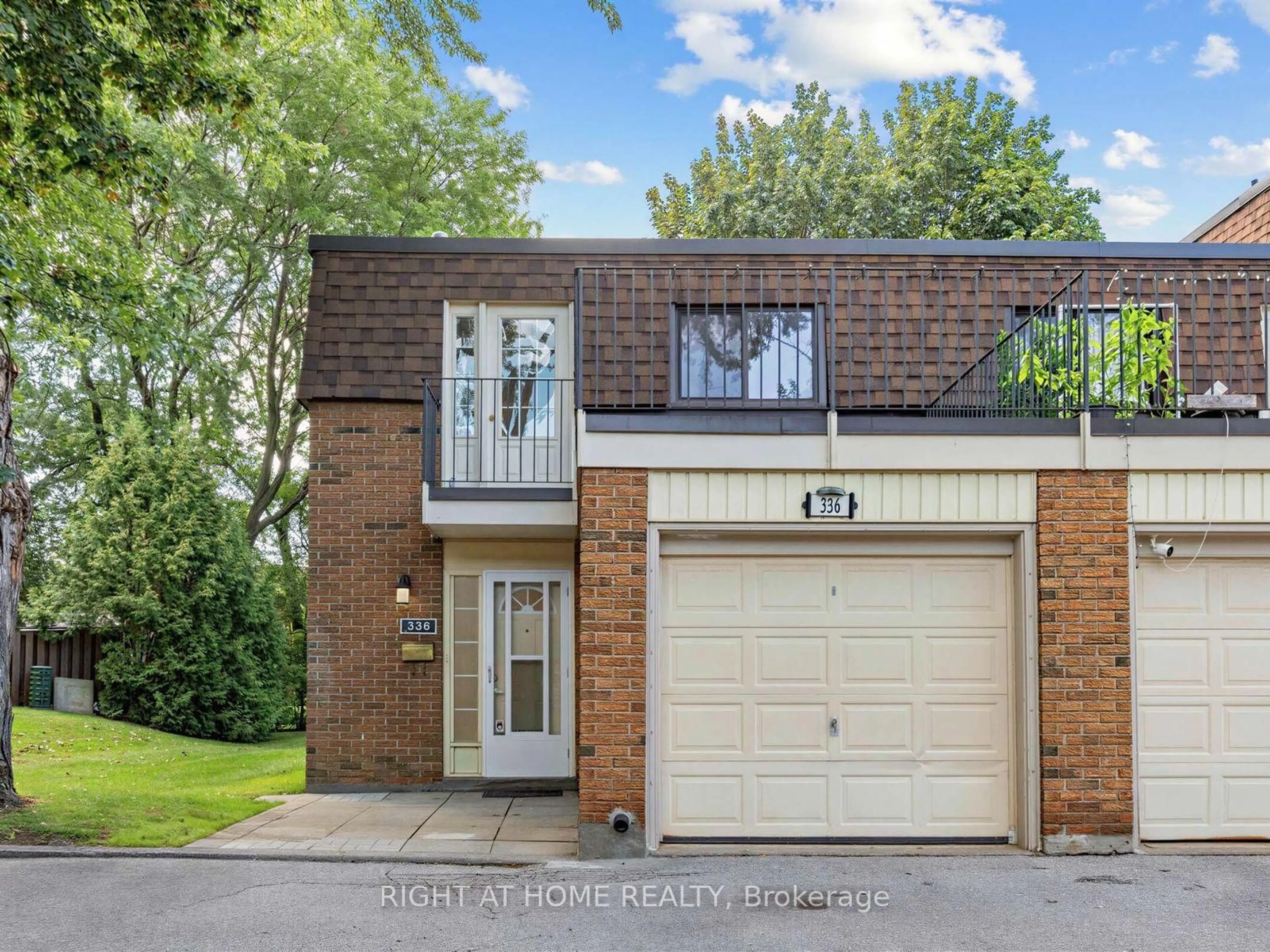 Home with brick exterior material, street for 336 Sprucewood Crt, Toronto Ontario M1W 1R1