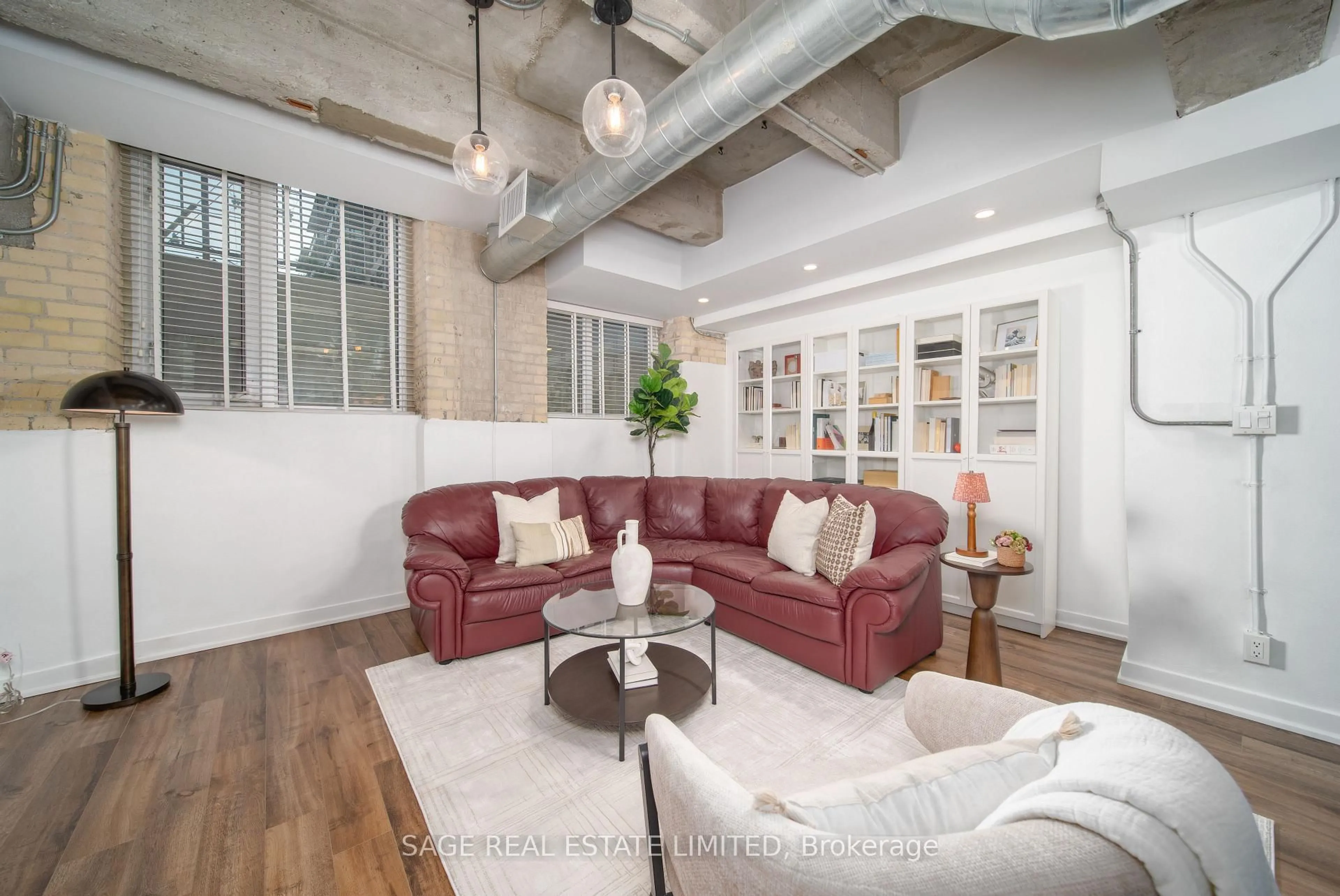 Living room with furniture, unknown for 201 Carlaw Ave #128, Toronto Ontario M4M 2S3