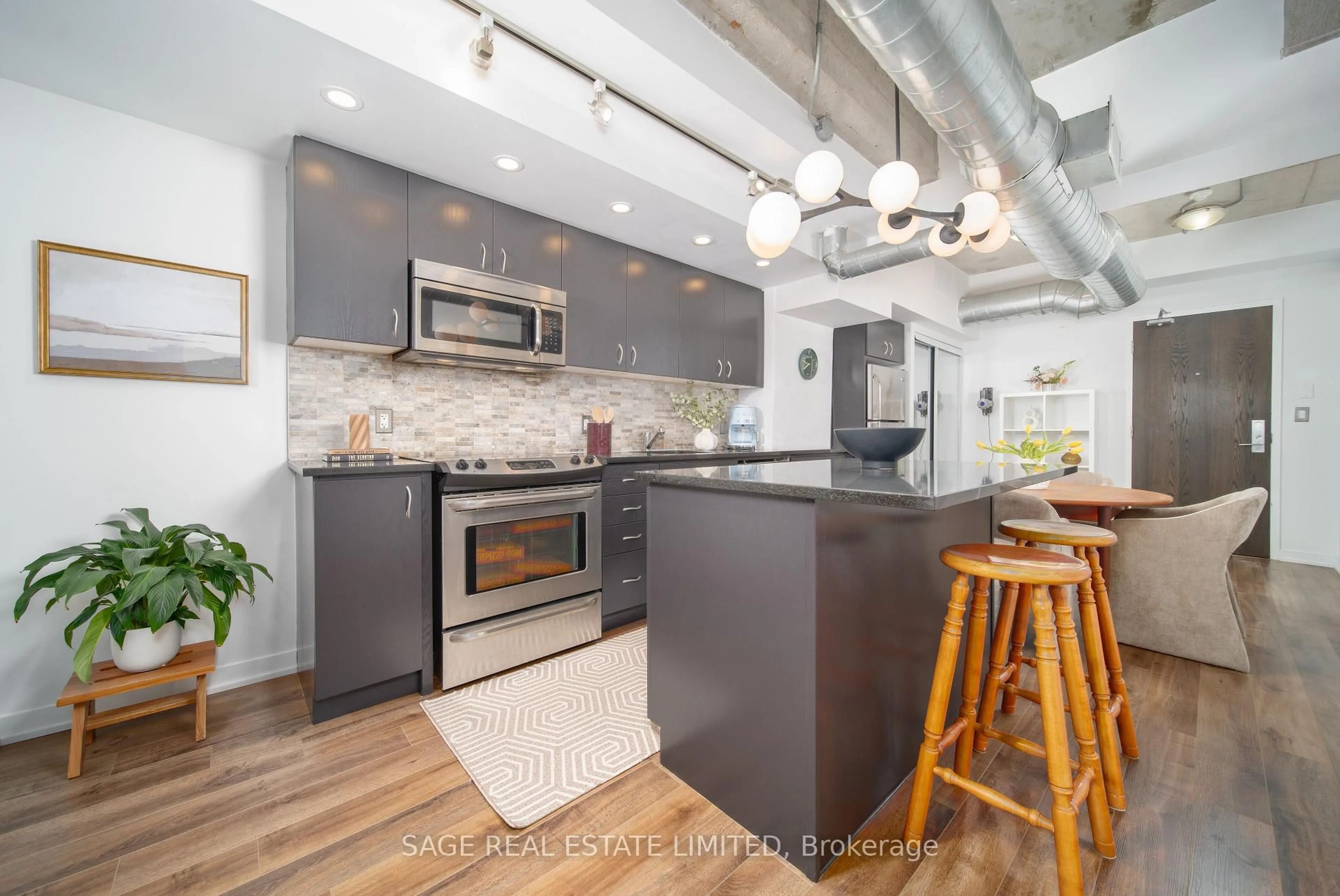 Open concept kitchen, unknown for 201 Carlaw Ave #128, Toronto Ontario M4M 2S3