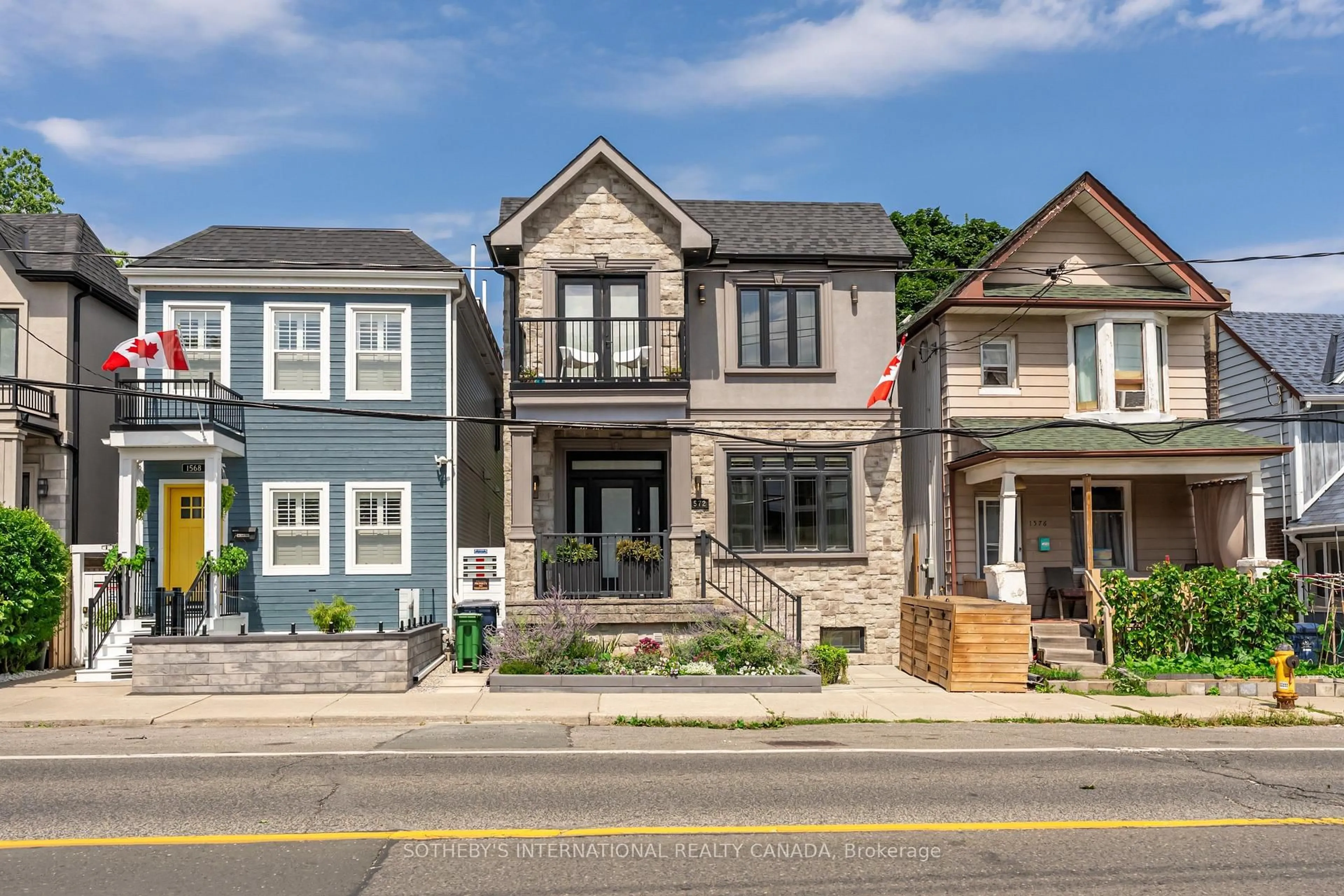 Home with brick exterior material, street for 1572 Dundas St, Toronto Ontario M4L 1K8