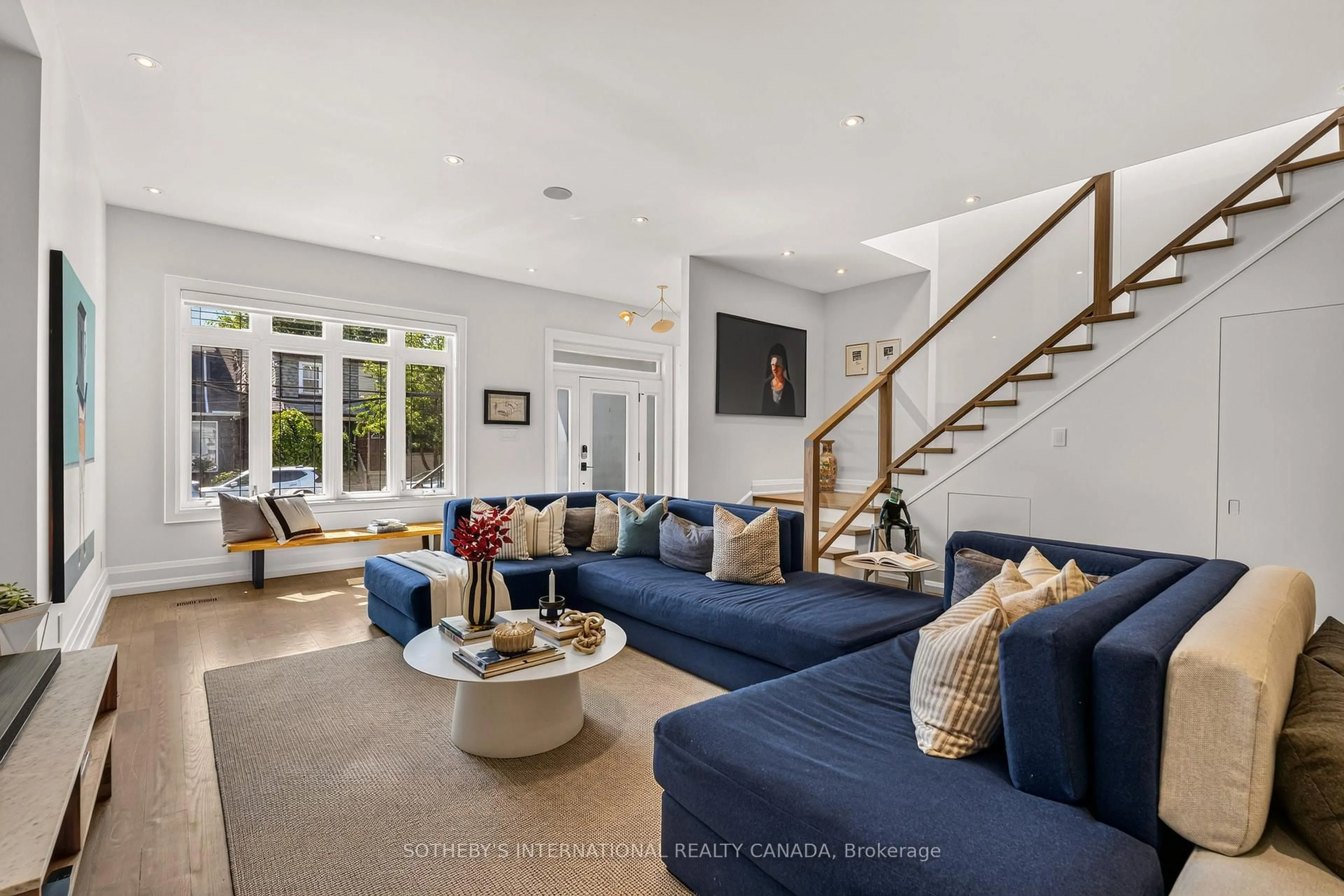 Living room with furniture, unknown for 1572 Dundas St, Toronto Ontario M4L 1K8