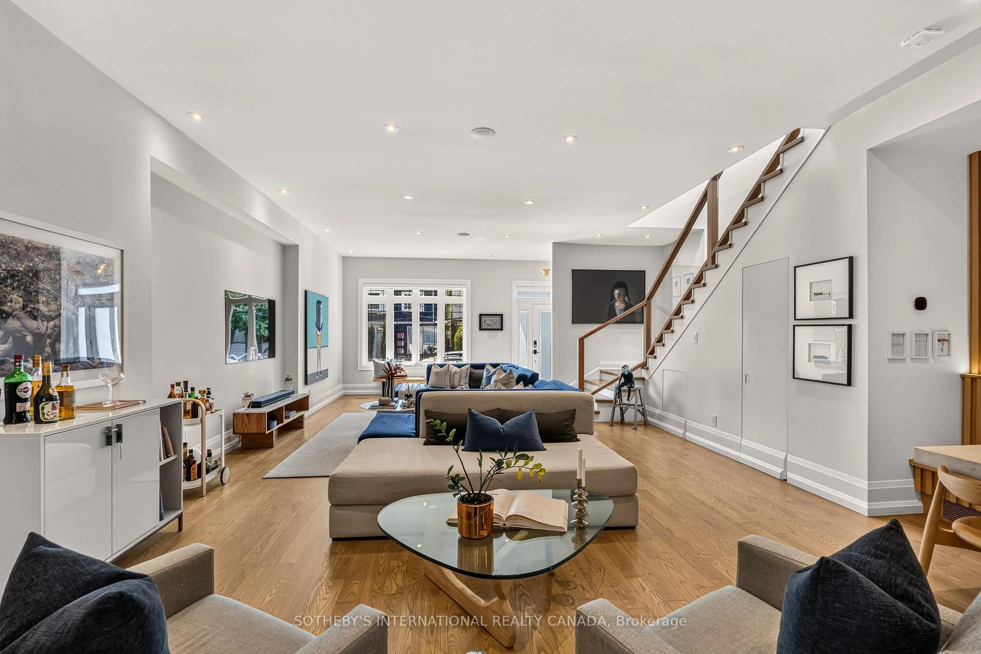 Living room with furniture, unknown for 1572 Dundas St, Toronto Ontario M4L 1K8