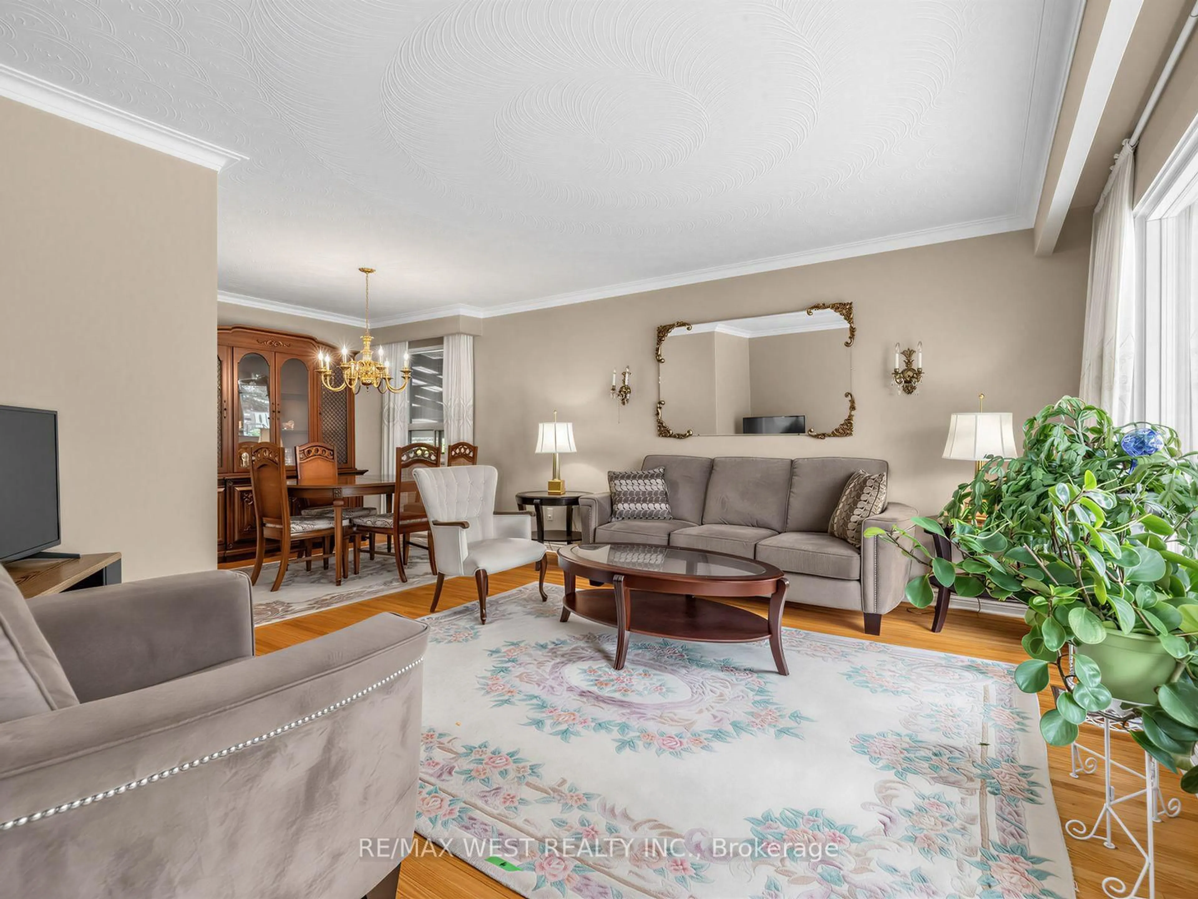 Living room with furniture, unknown for 407 Brimorton Dr, Toronto Ontario M1H 2E4