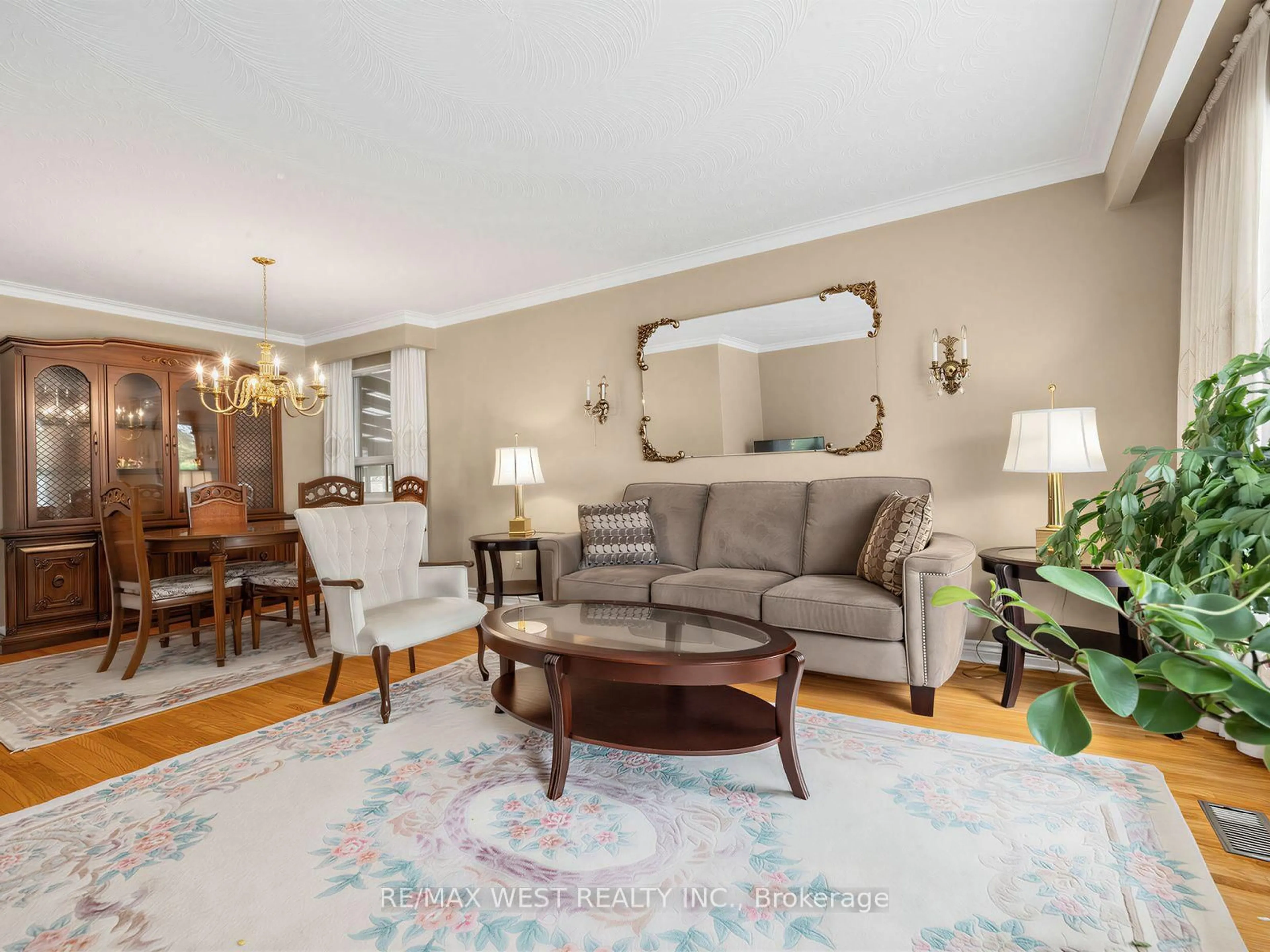 Living room with furniture, unknown for 407 Brimorton Dr, Toronto Ontario M1H 2E4