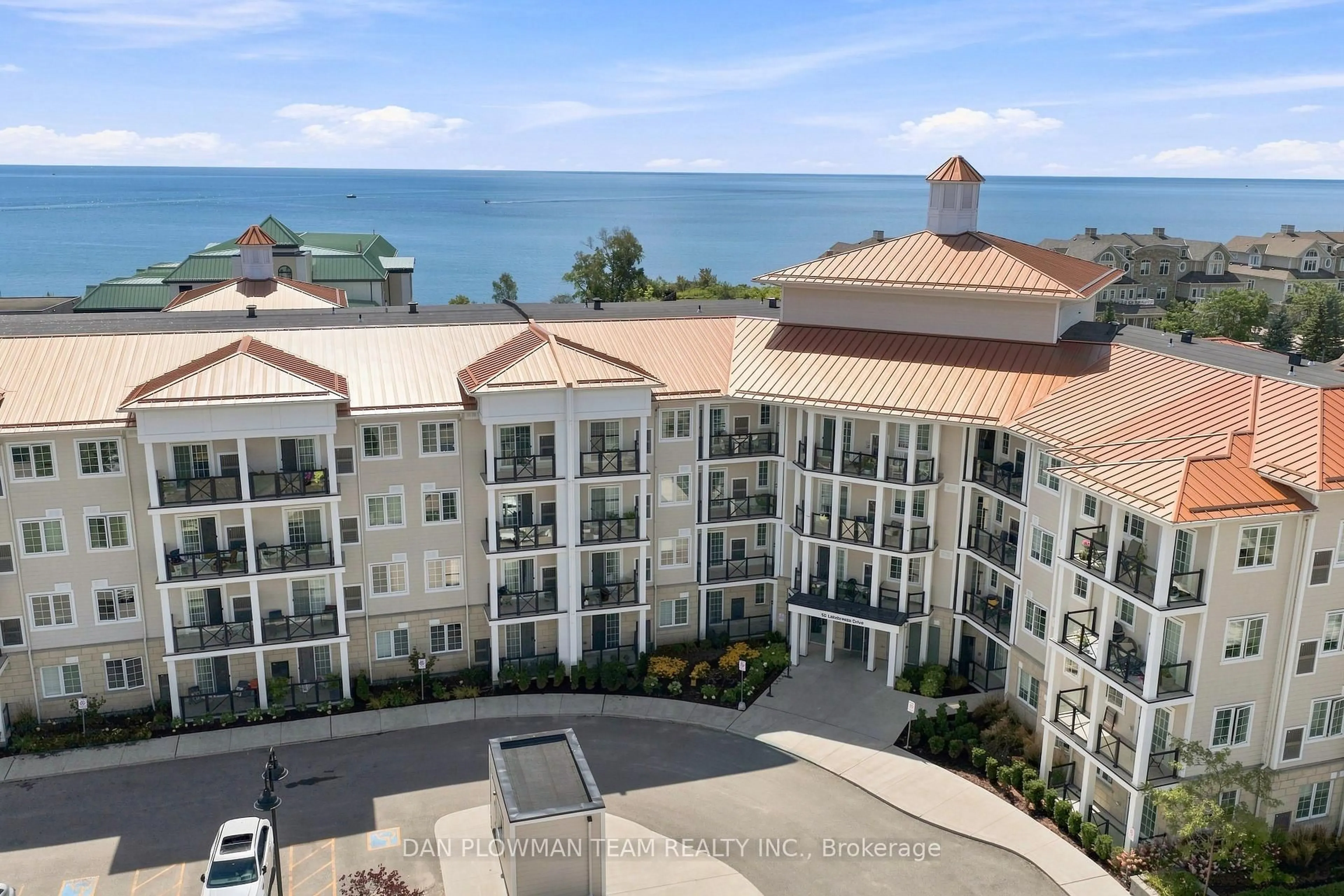 A pic from outside/outdoor area/front of a property/back of a property/a pic from drone, water/lake/river/ocean view for 50 Lakebreeze Dr #424, Clarington Ontario L1B 0V9