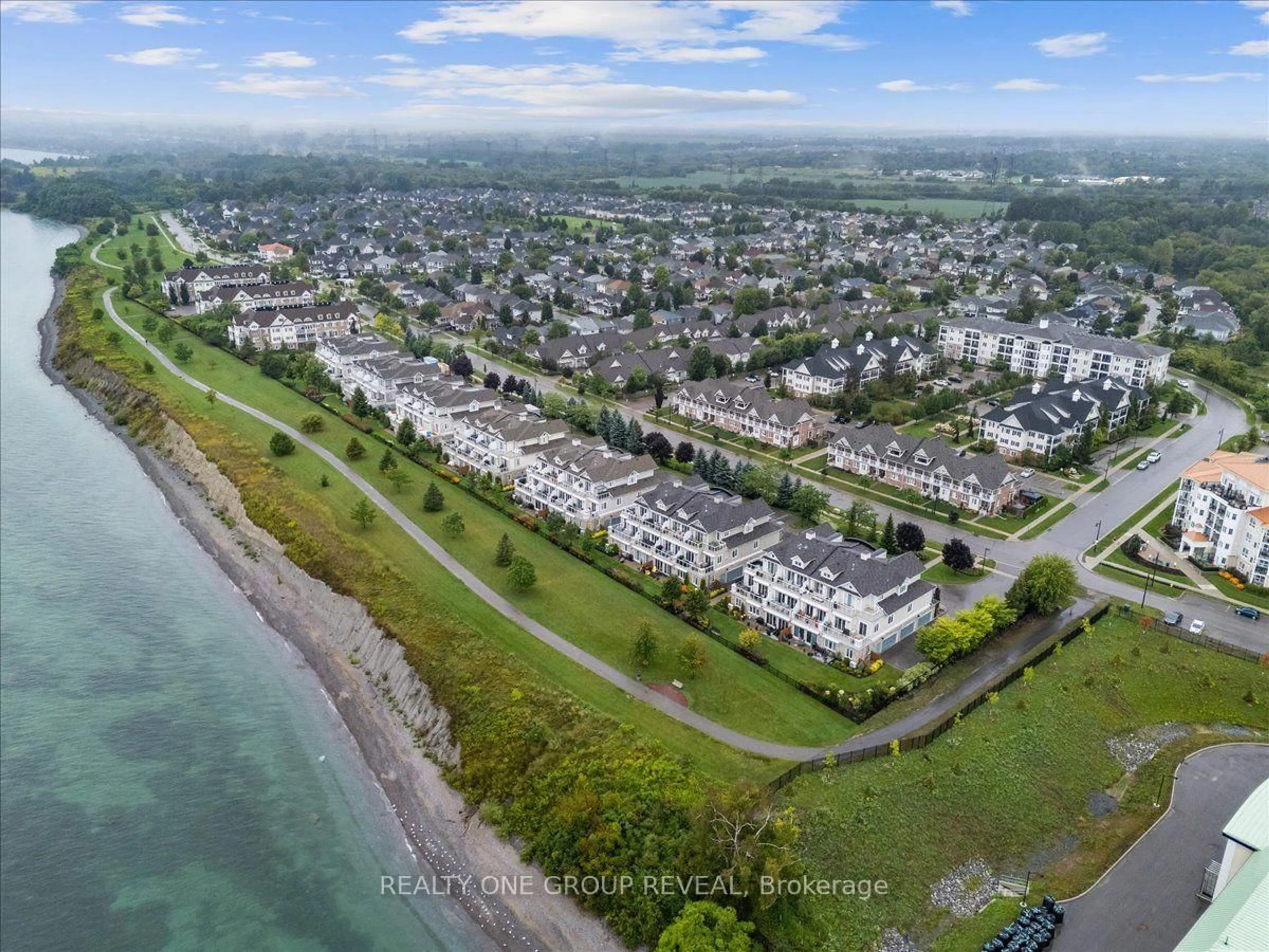 A pic from outside/outdoor area/front of a property/back of a property/a pic from drone, water/lake/river/ocean view for 65 Shipway Ave #111, Clarington Ontario L1B 0W2