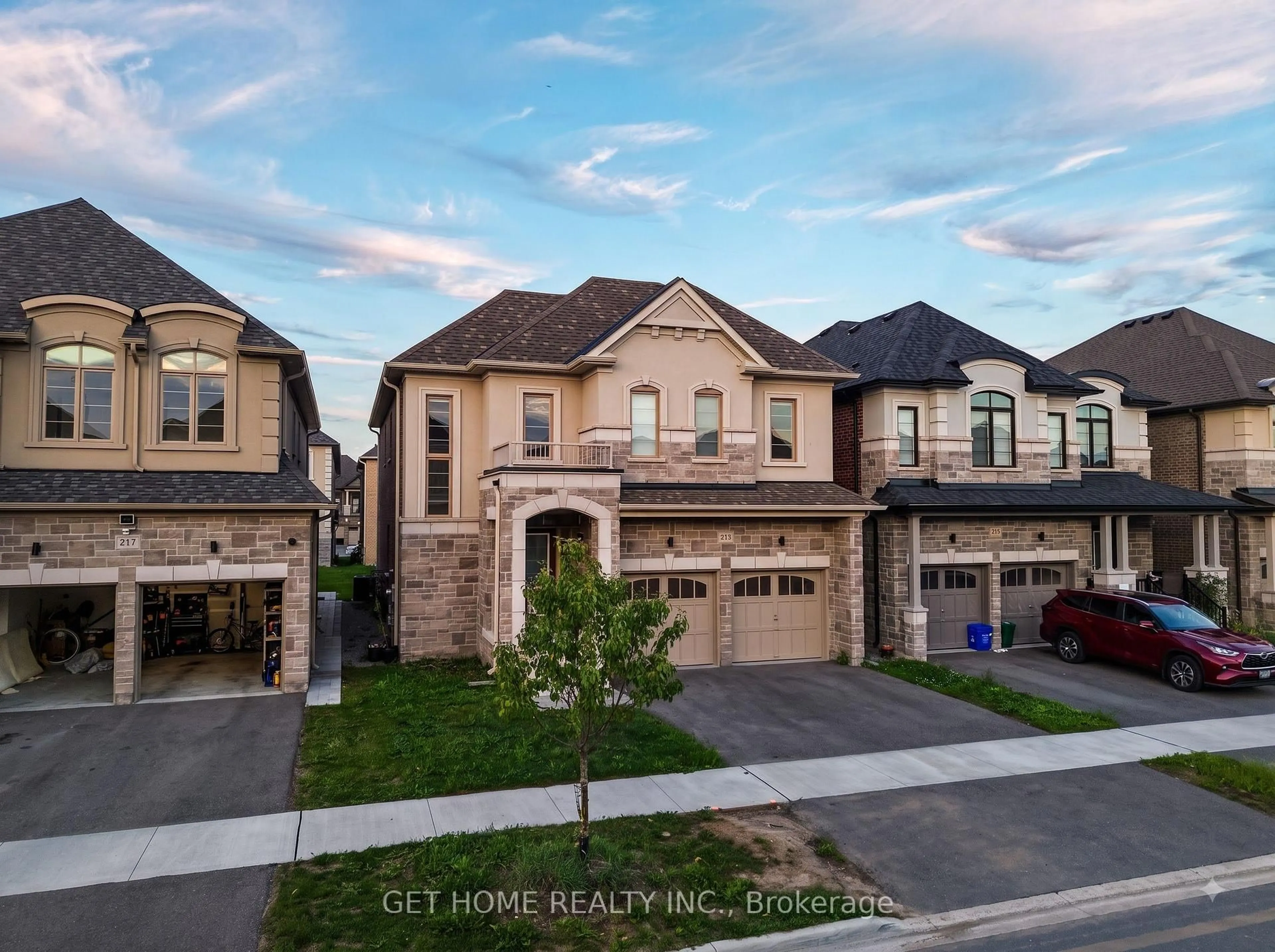 A pic from outside/outdoor area/front of a property/back of a property/a pic from drone, street for 215 Ronald Gustcott Dr, Oshawa Ontario L1K 3G3