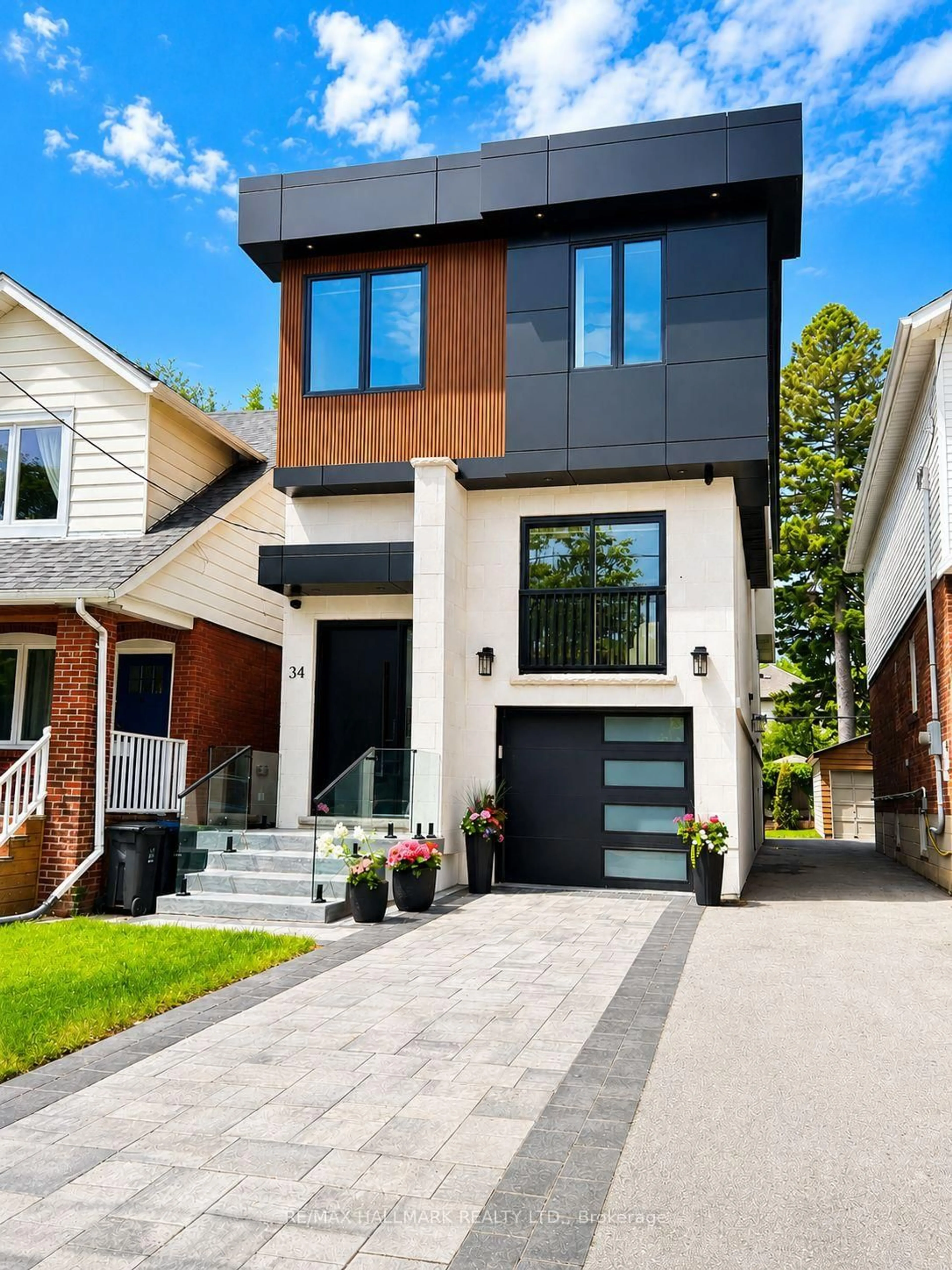 Home with brick exterior material, street for 34 Roosevelt Rd, Toronto Ontario M4J 4T6