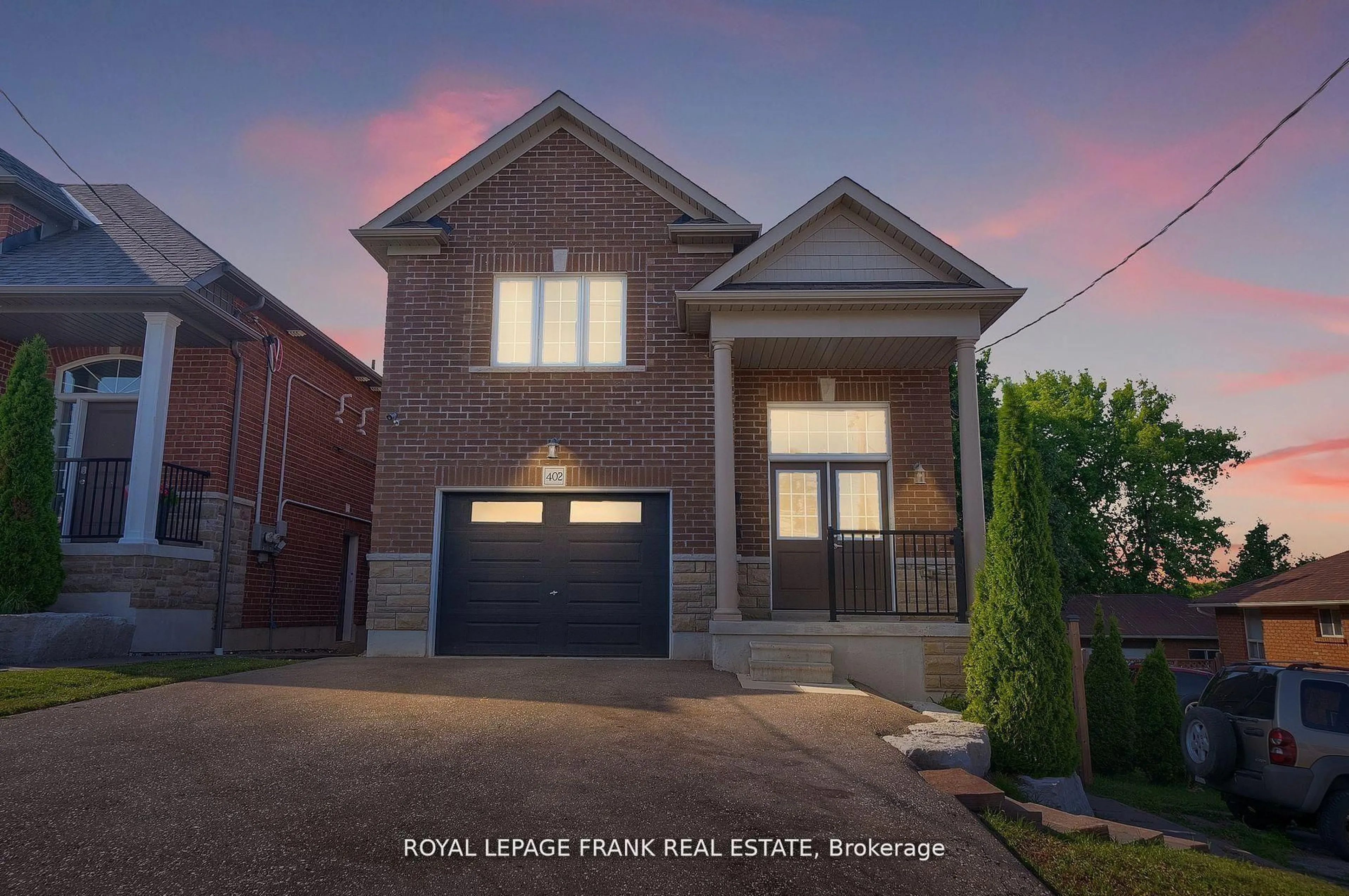 Home with brick exterior material, street for 402 Olive Ave, Oshawa Ontario L1H 2R1