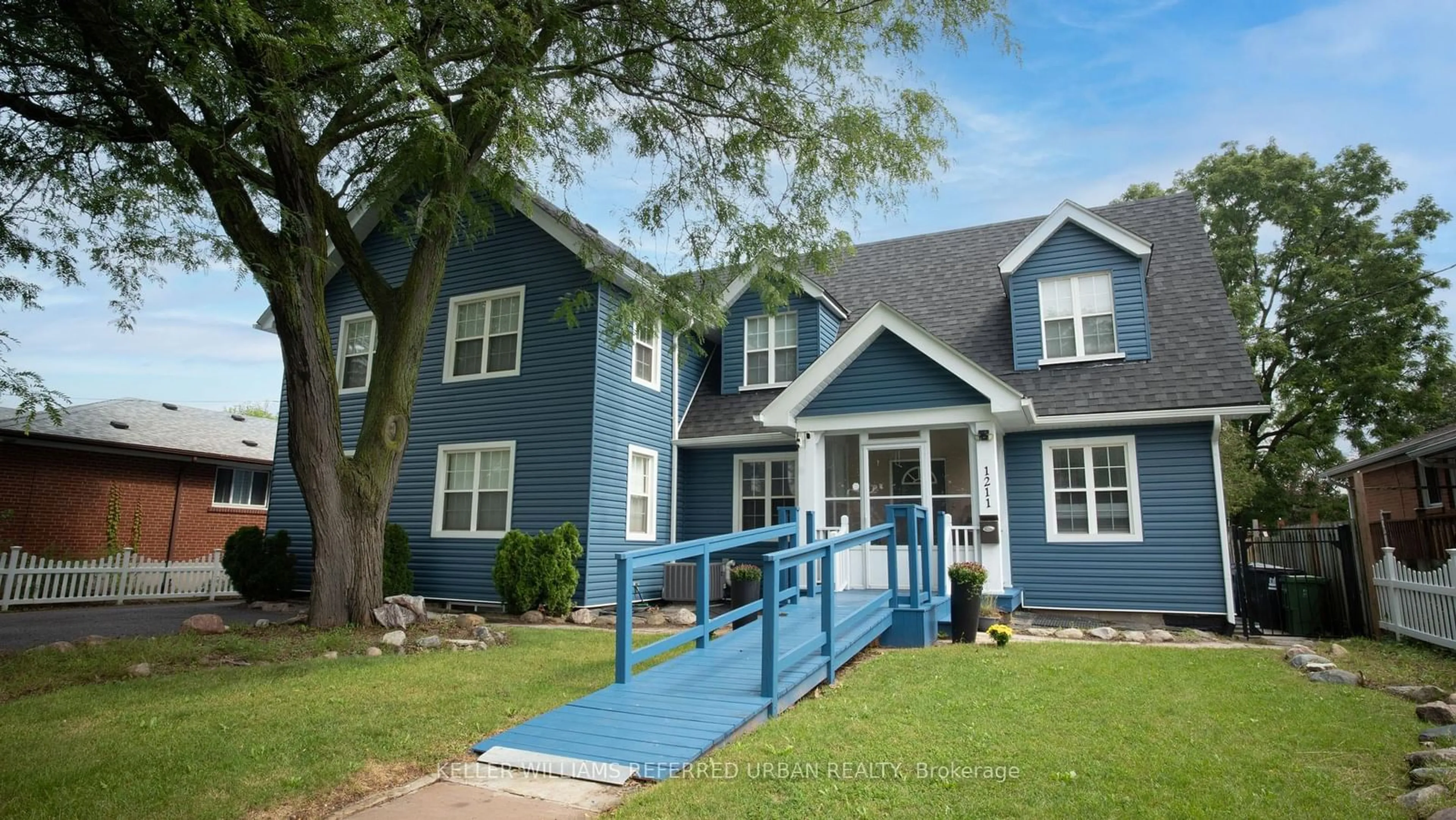 Home with vinyl exterior material, street for 1211 Pharmacy Ave, Toronto Ontario M1R 2H8