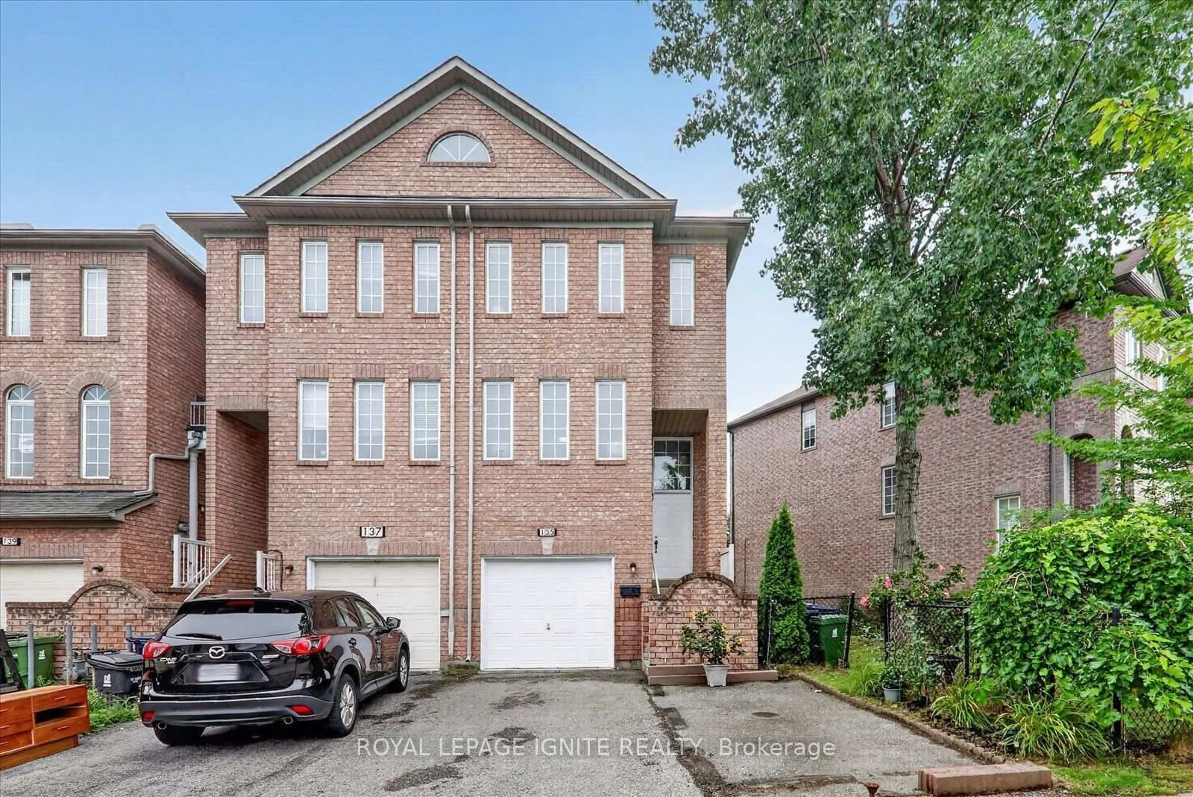 Home with brick exterior material, street for 135 Conn Smythe Dr, Toronto Ontario M1J 3P6