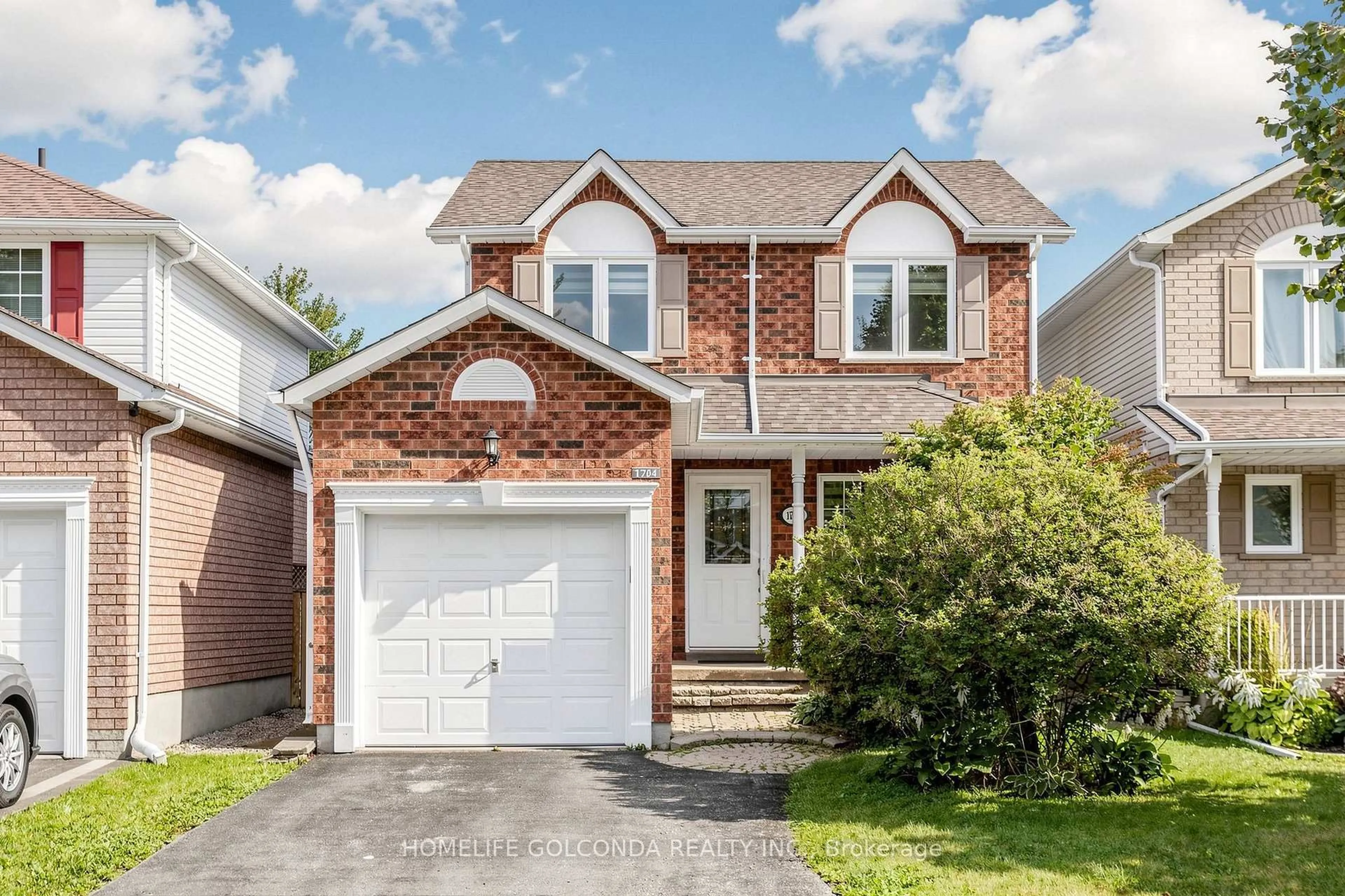 Home with brick exterior material, street for 1704 Canadore Cres, Oshawa Ontario L1G 8A7