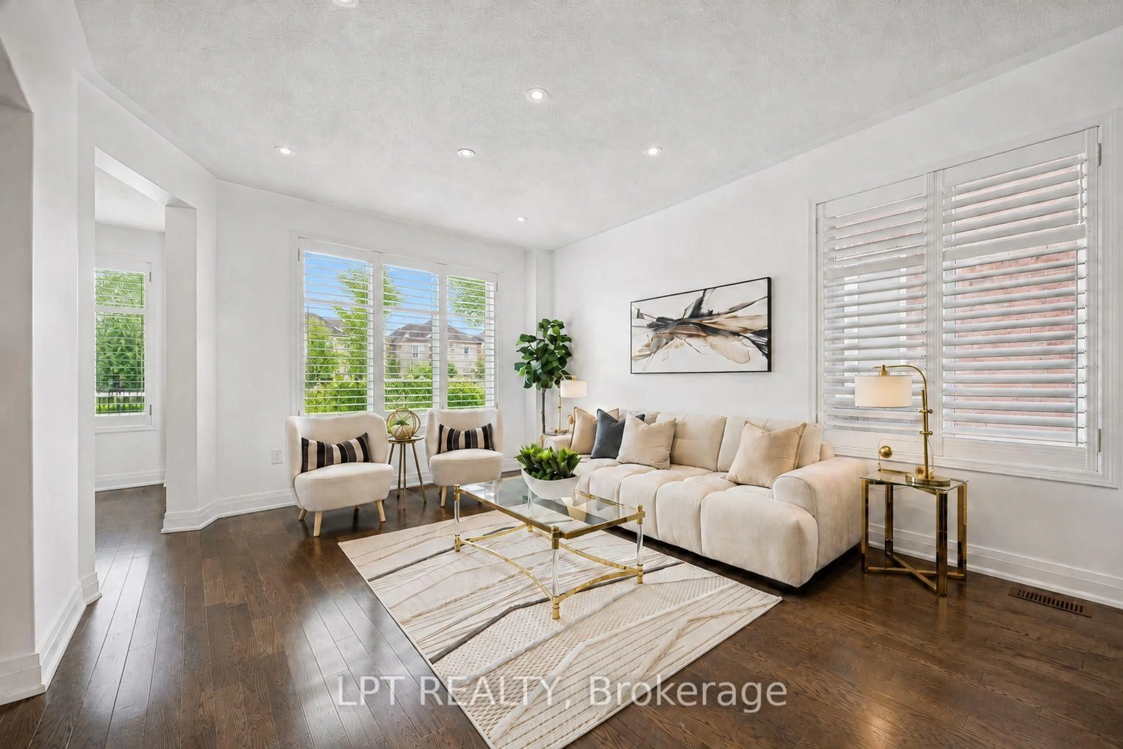 Living room with furniture, wood/laminate floor for 61 Minerva Ave, Toronto Ontario M1M 0C2