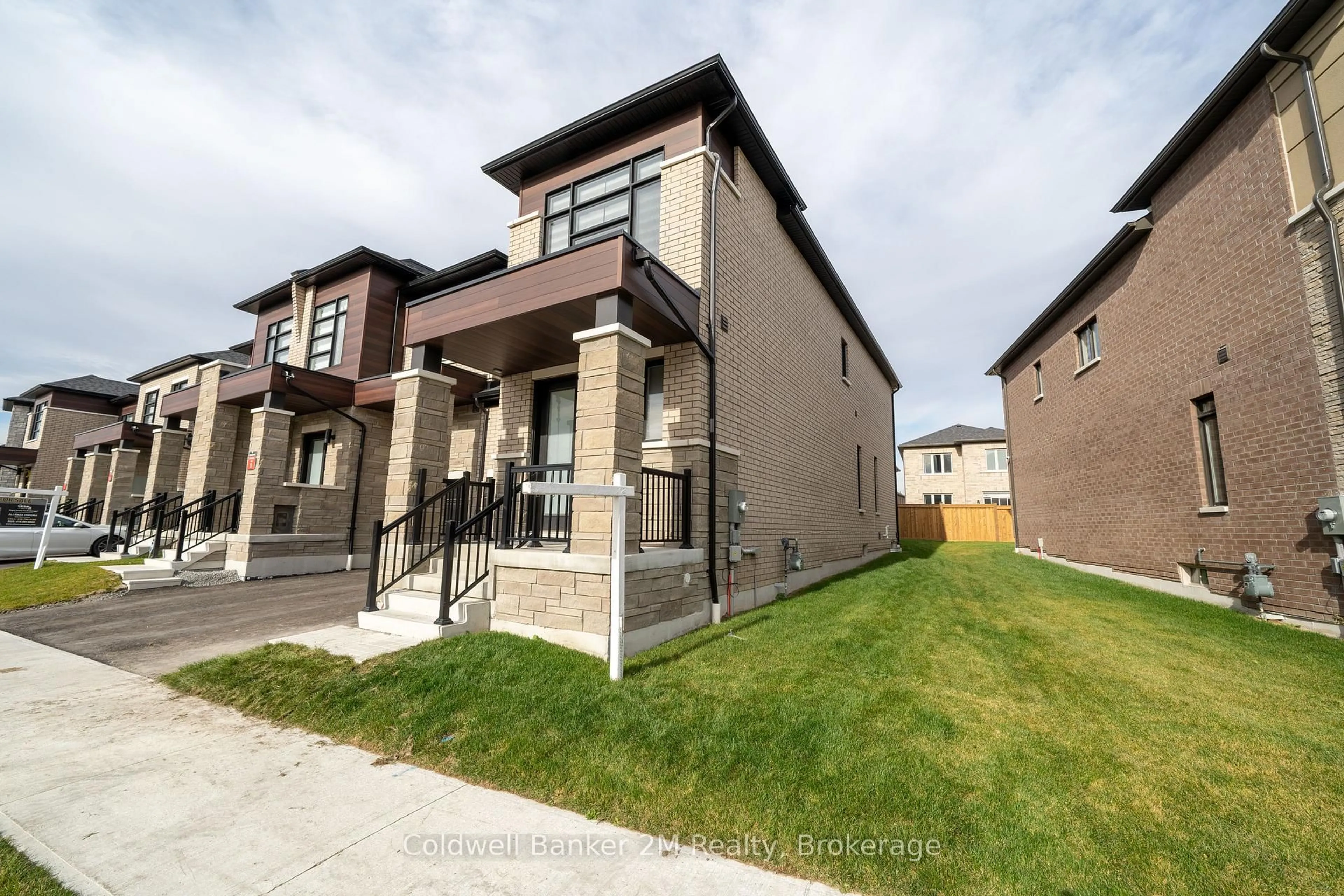 Home with brick exterior material, street for 136 Ogston Cres, Whitby Ontario L1P 0H3