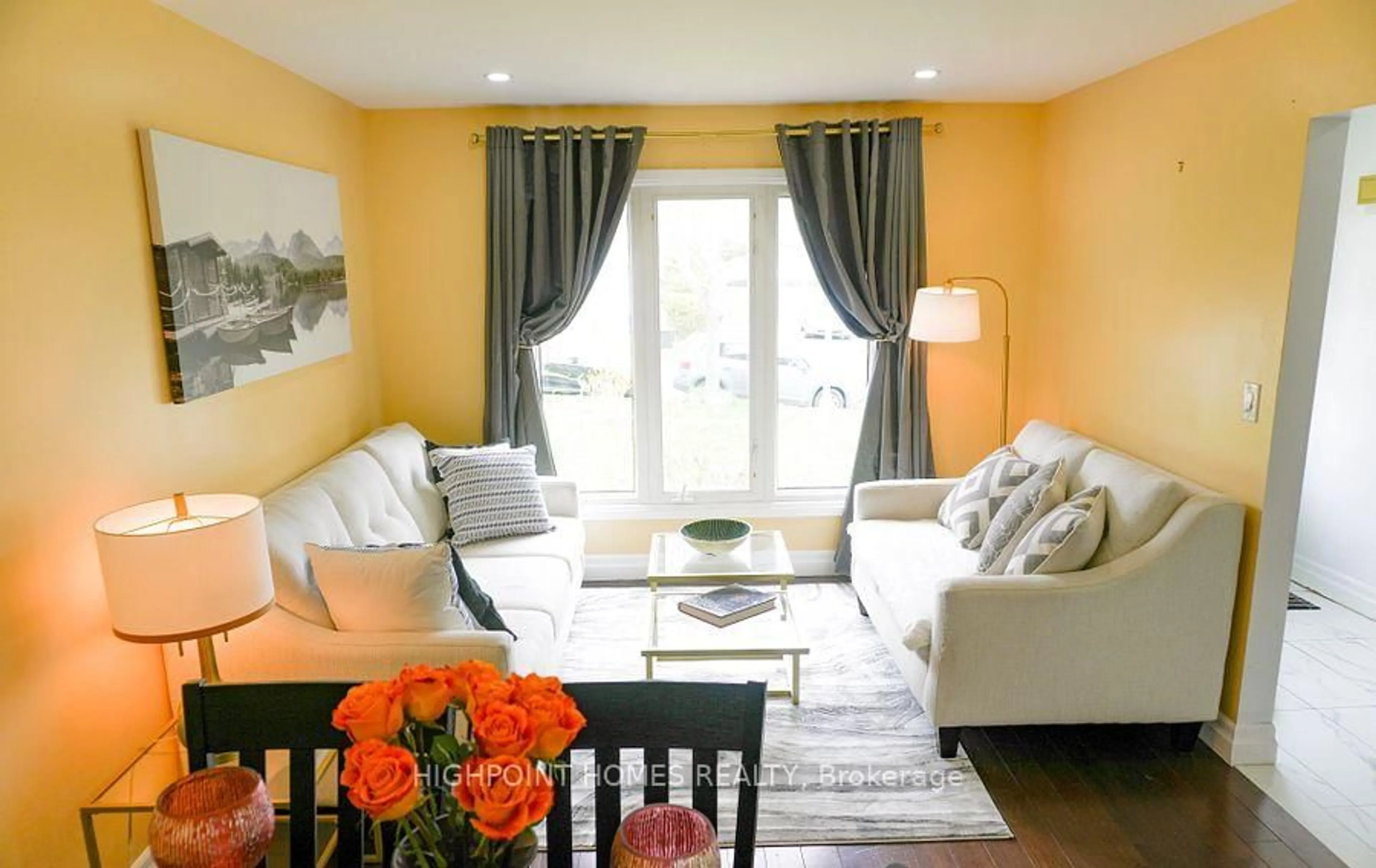 Living room with furniture, wood/laminate floor for 522 Powell Rd, Whitby Ontario L1N 6Y7