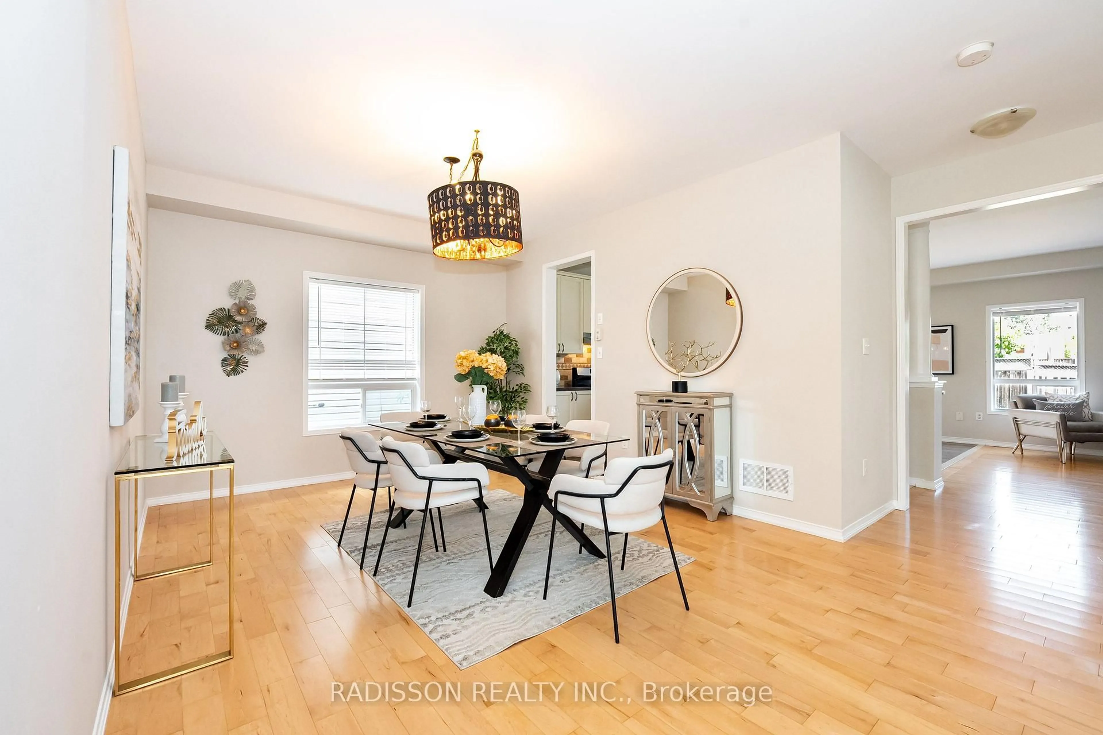 Dining room, wood/laminate floor for 1679 Arborwood Dr, Oshawa Ontario L1K 0H2