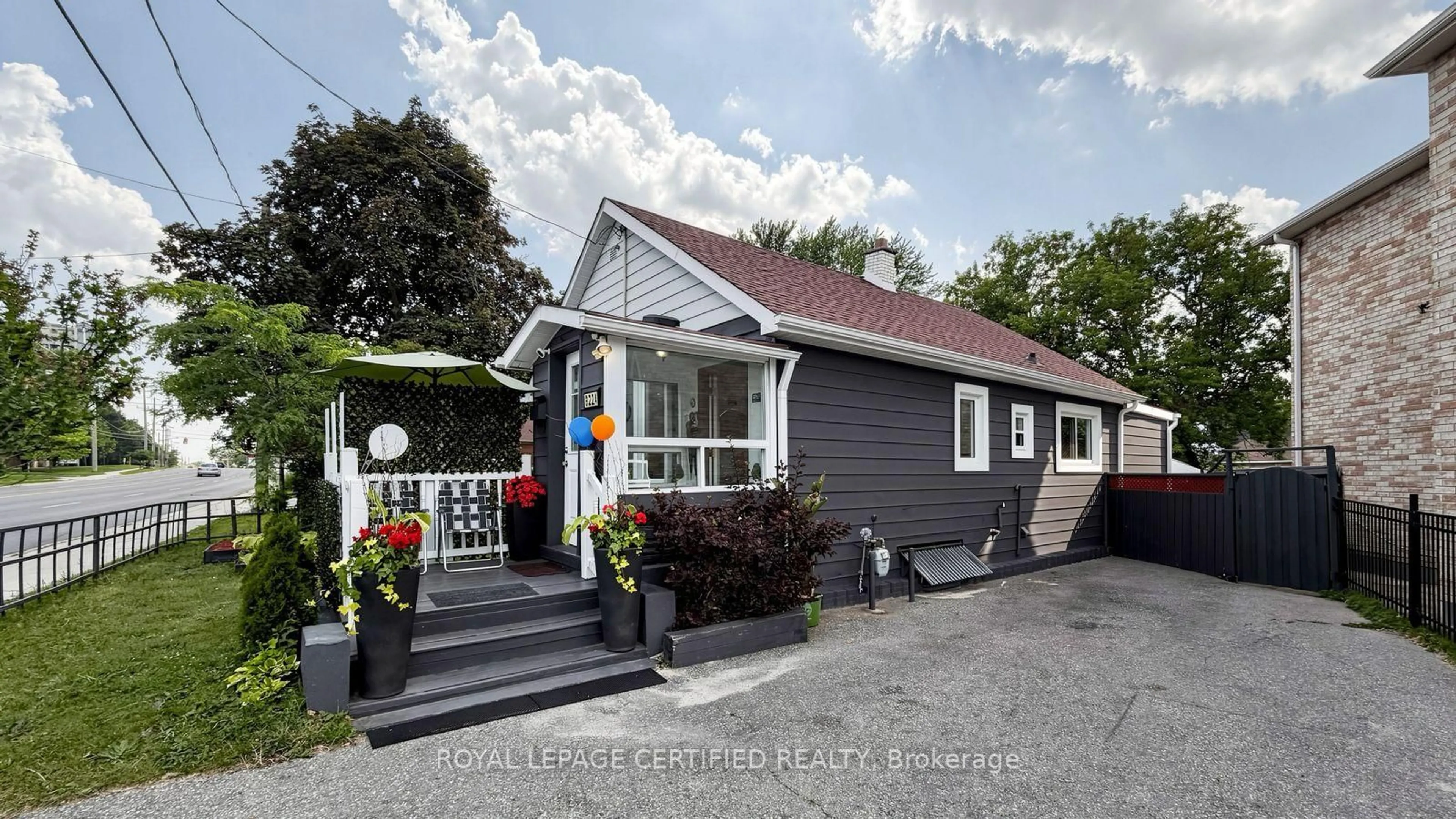 Home with vinyl exterior material, street for 922A Danforth Rd, Toronto Ontario M1K 1H9