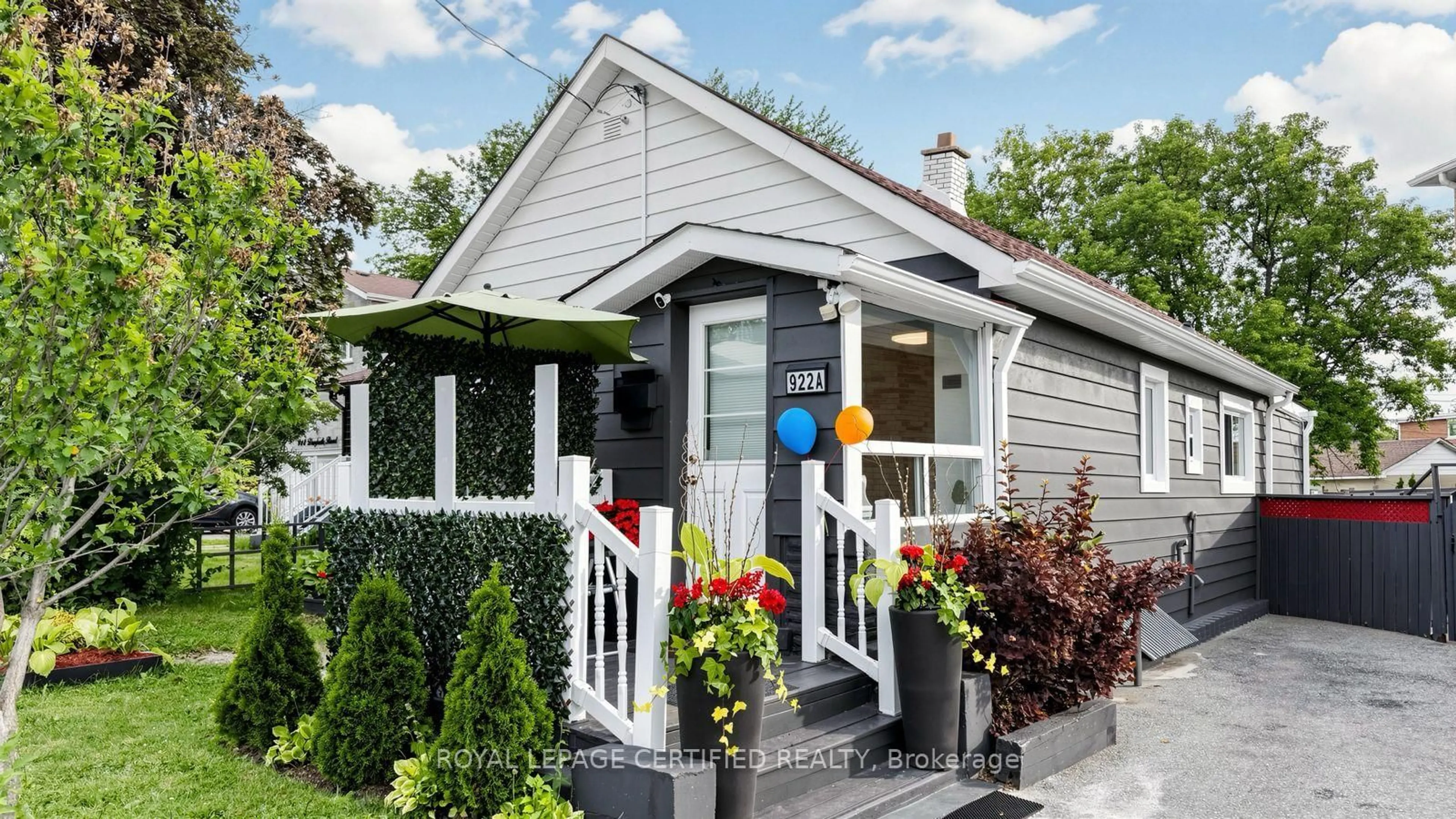 Home with vinyl exterior material, street for 922A Danforth Rd, Toronto Ontario M1K 1H9