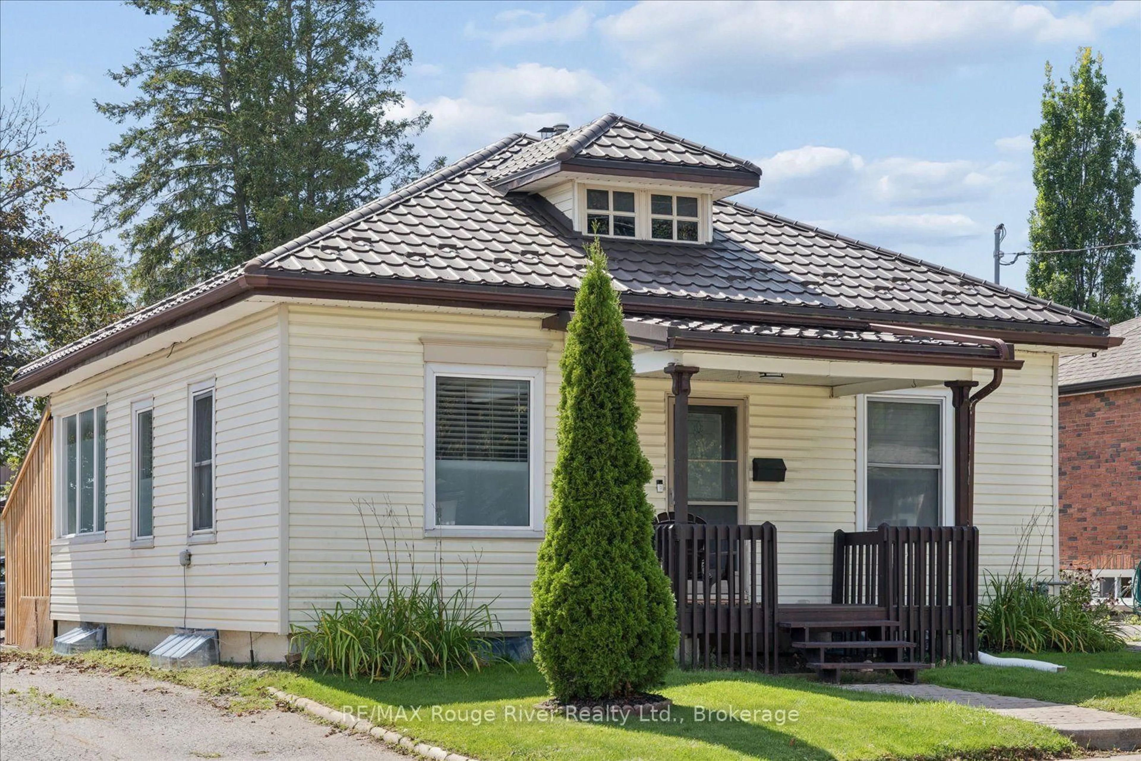 Home with vinyl exterior material, street for 65 Church St, Clarington Ontario L1C 1S8
