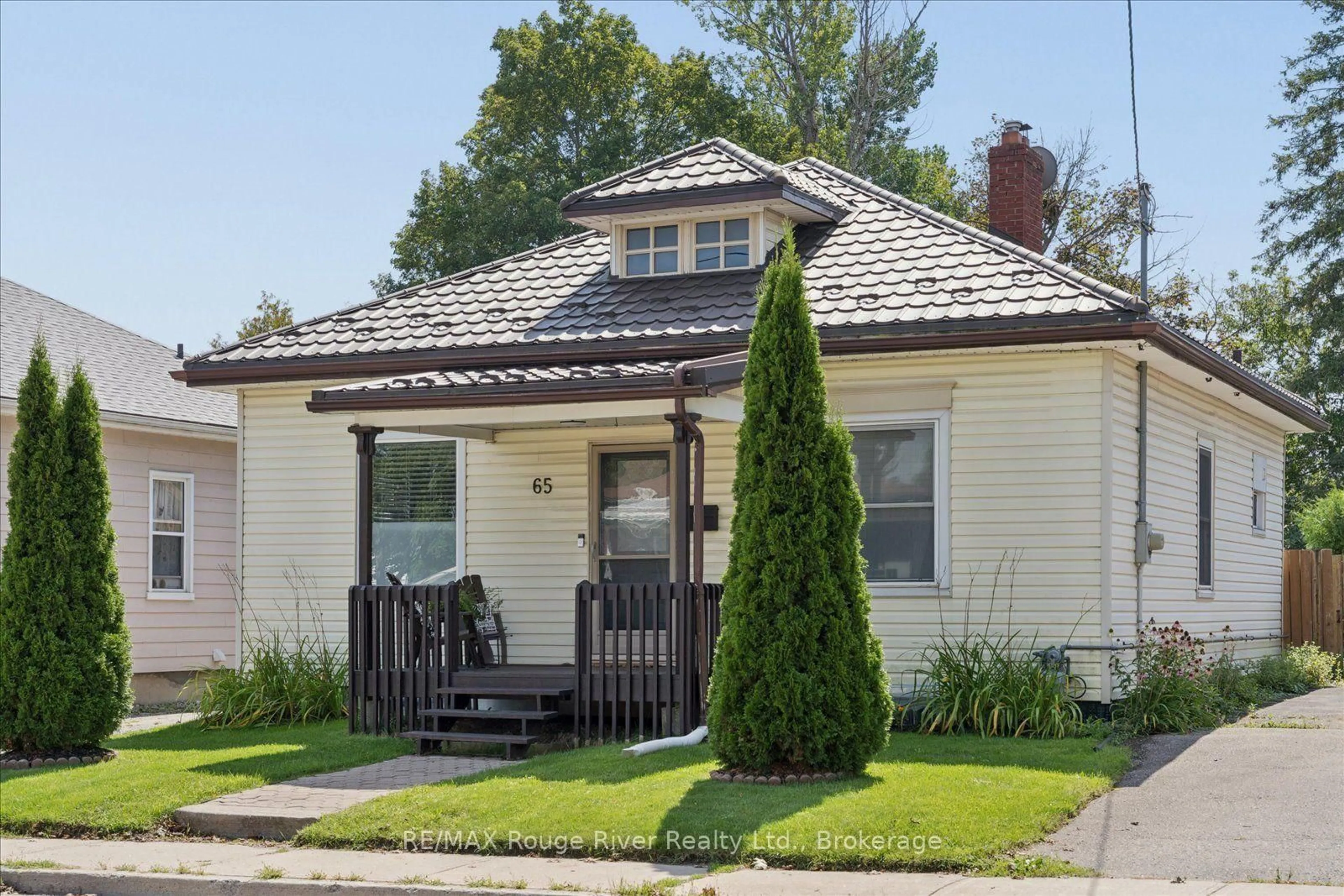 Home with brick exterior material, street for 65 Church St, Clarington Ontario L1C 1S8