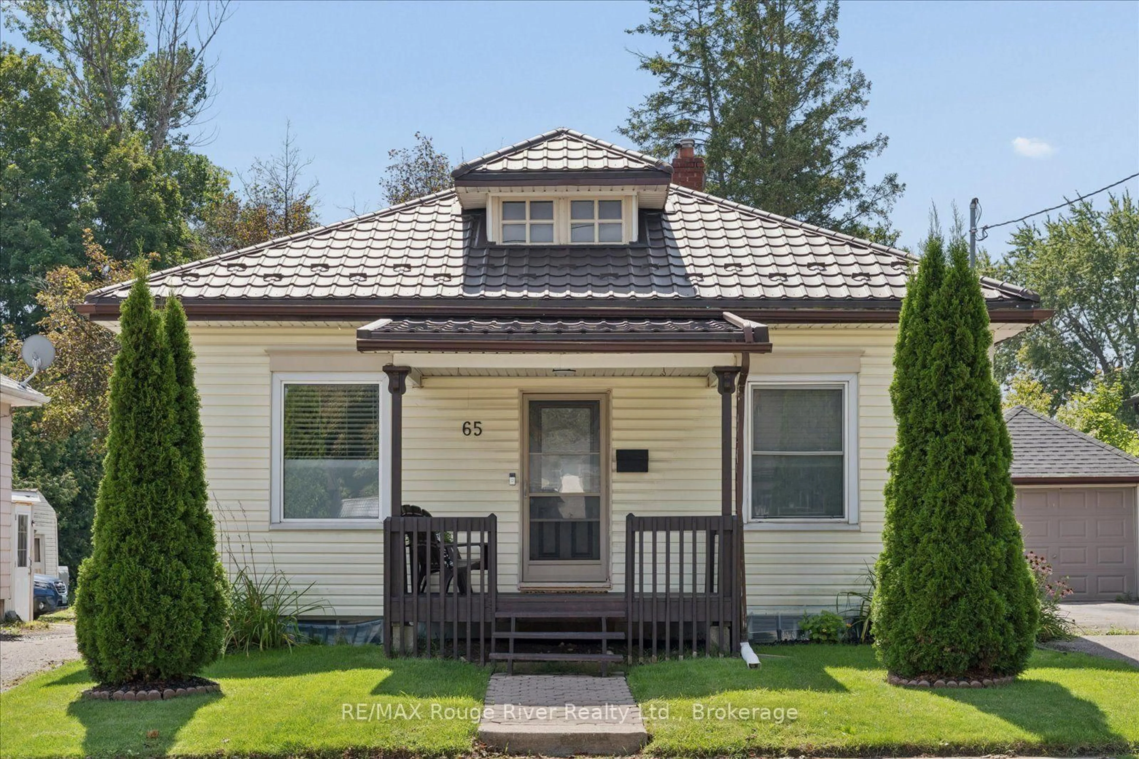 Home with vinyl exterior material, street for 65 Church St, Clarington Ontario L1C 1S8