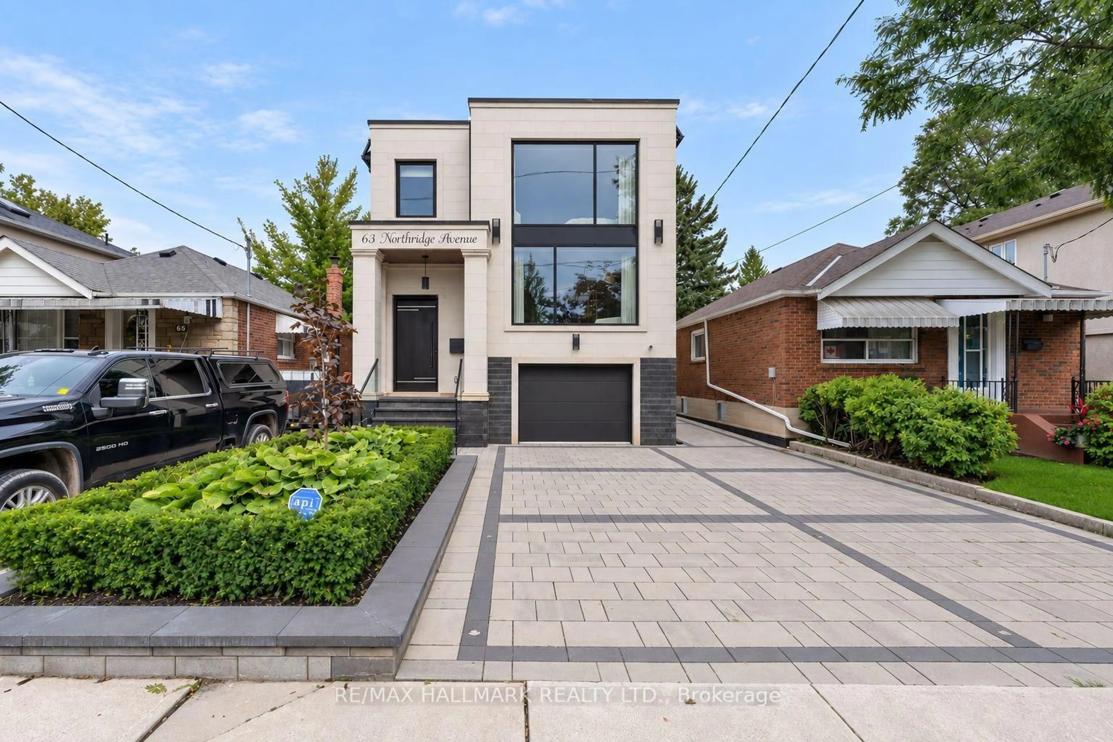 Home with brick exterior material, street for 63 Northridge Ave, Toronto Ontario M4J 4P4