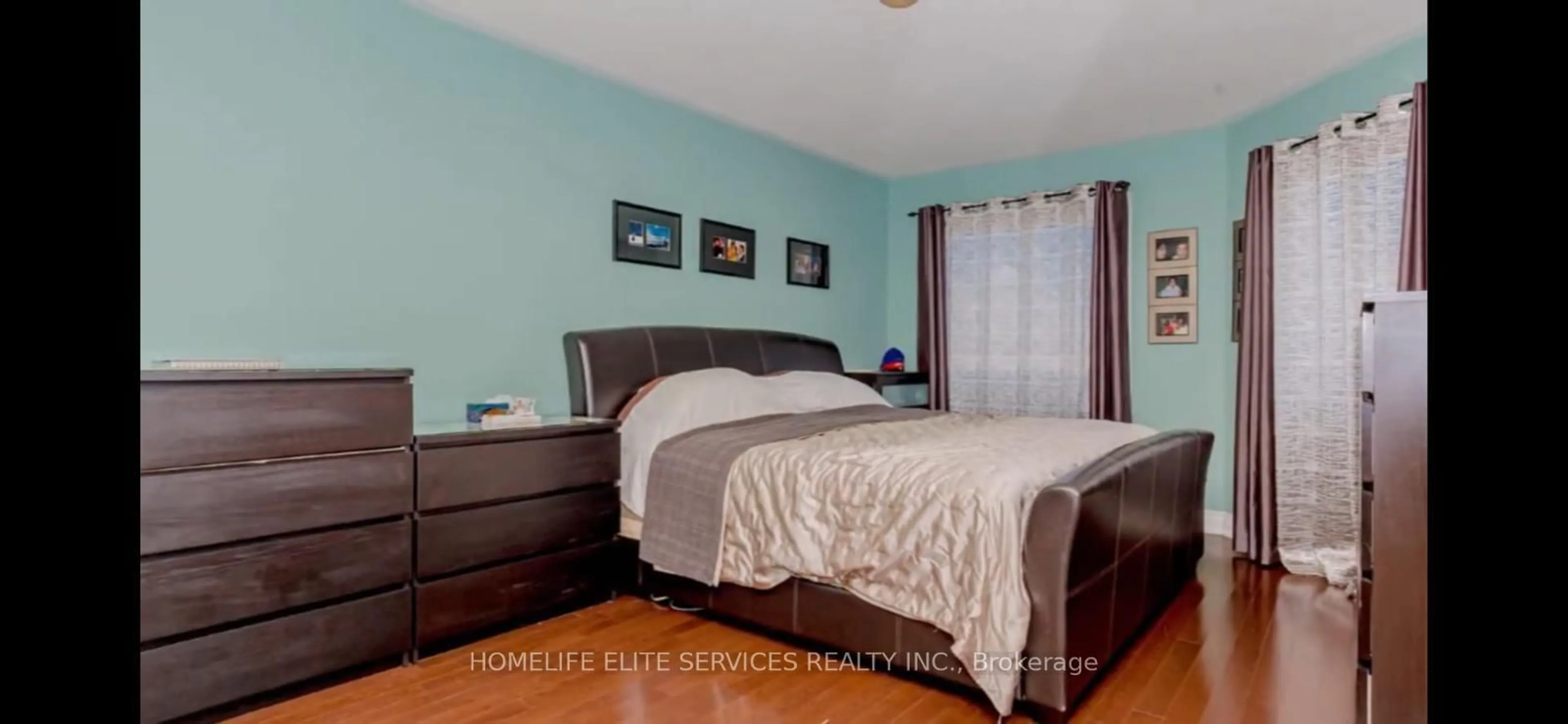 Bedroom with bed, wood/laminate floor for 73 Long Island Cres, Toronto Ontario M1C 5E4