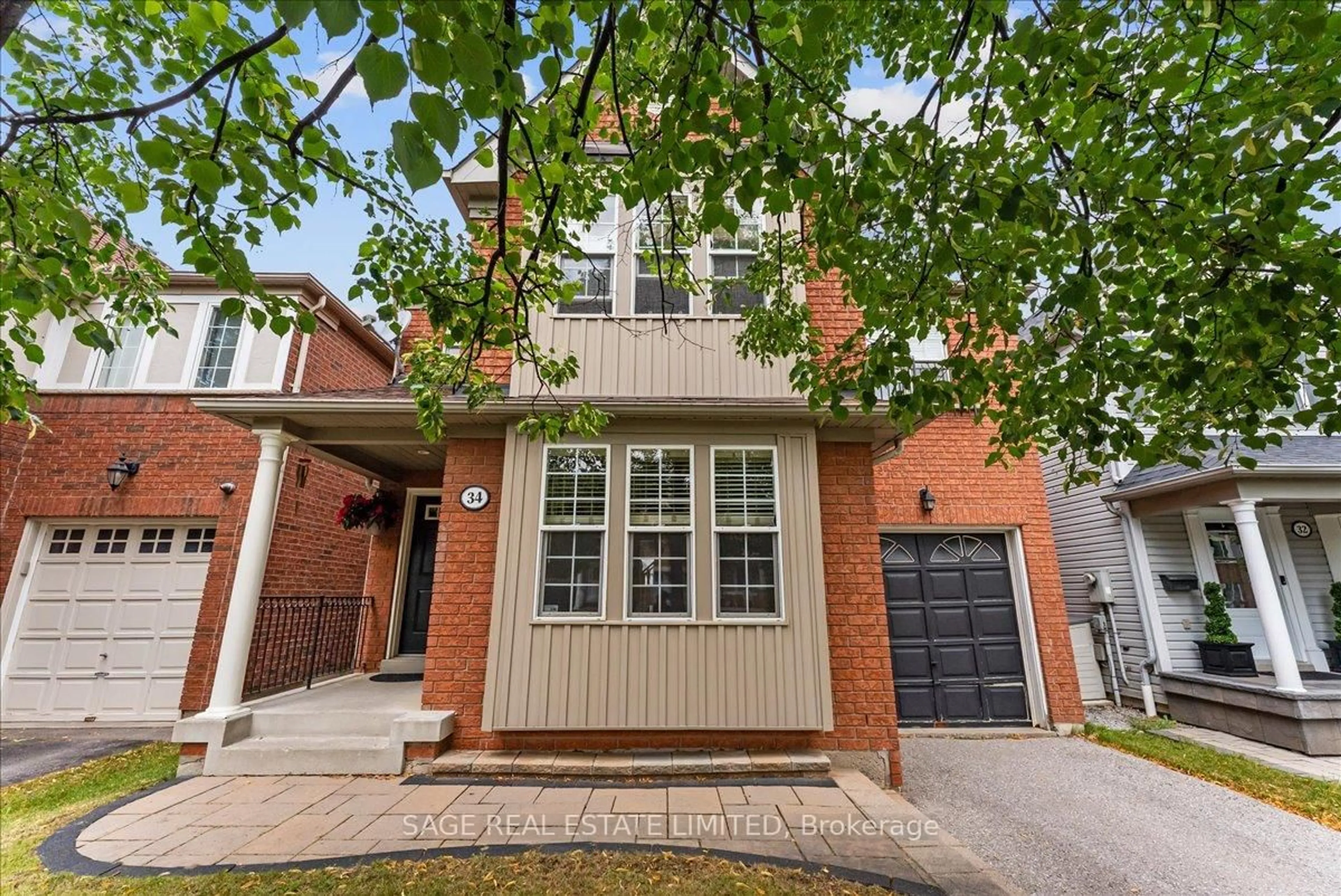 Home with brick exterior material, street for 34 Mcsweeney Cres, Ajax Ontario L1T 4C7