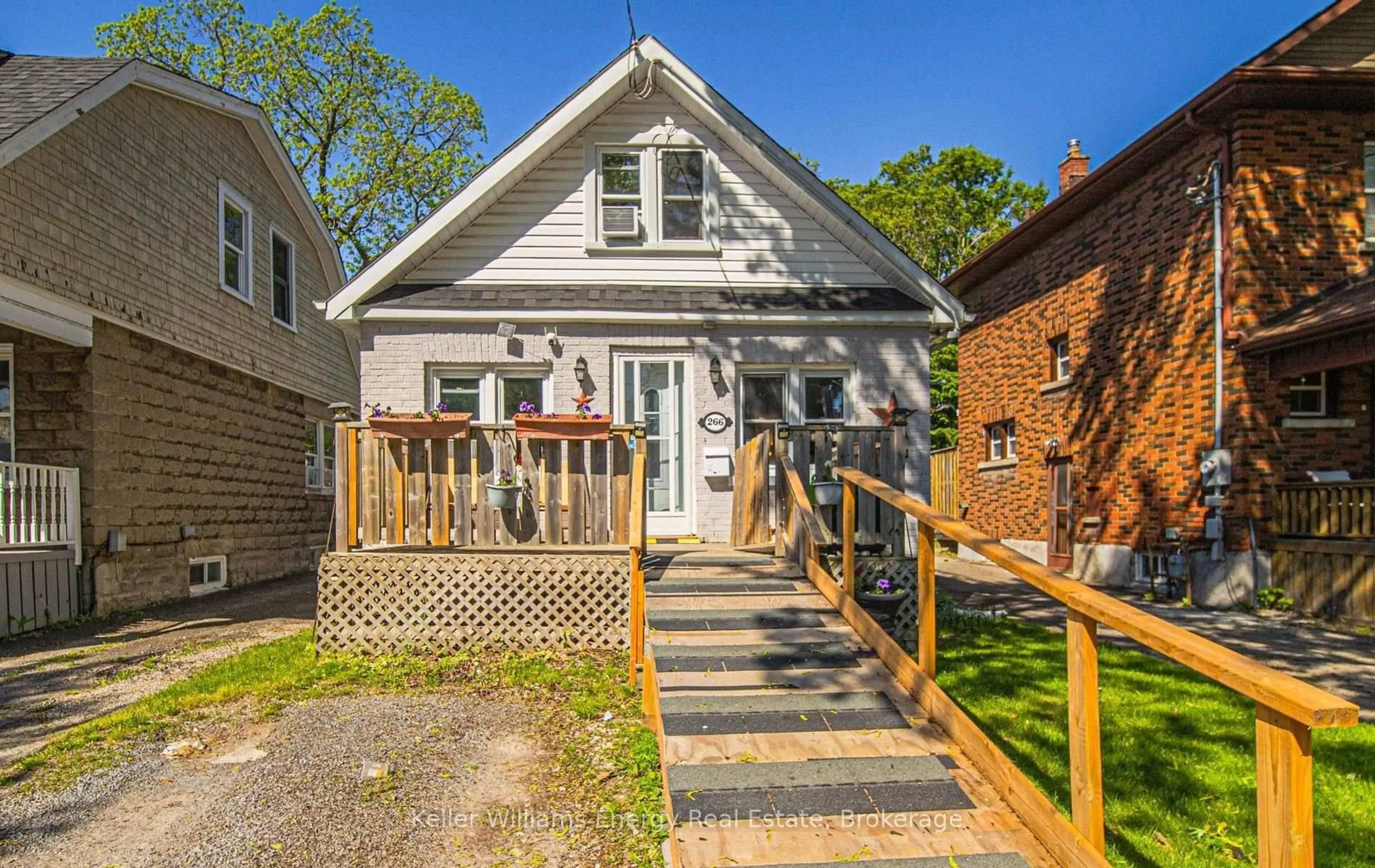 Home with brick exterior material, street for 266 Division St, Oshawa Ontario L1G 5M7