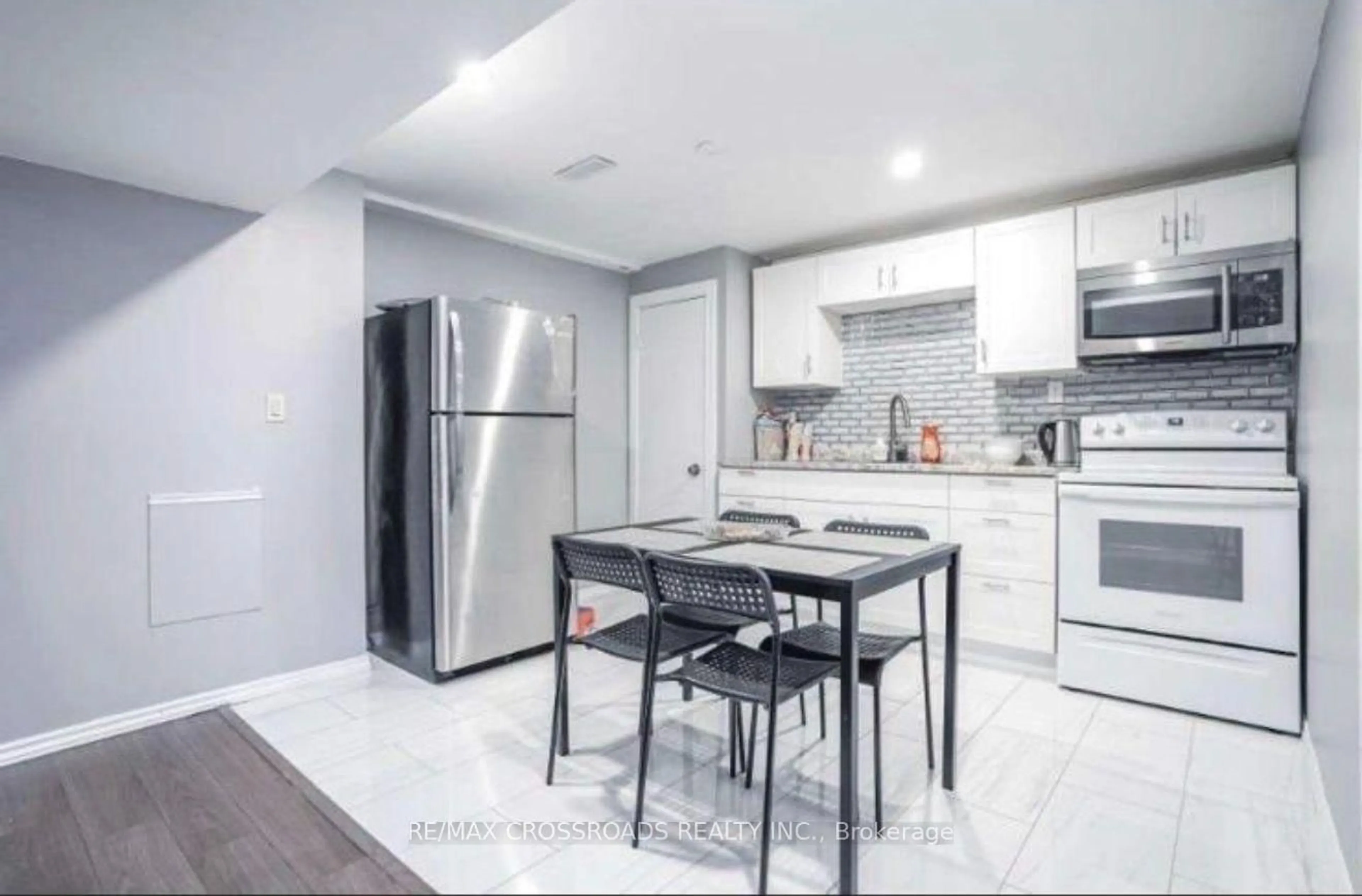 Open concept kitchen, ceramic/tile floor for 98 Kirby Cres, Whitby Ontario L1N 6Z7