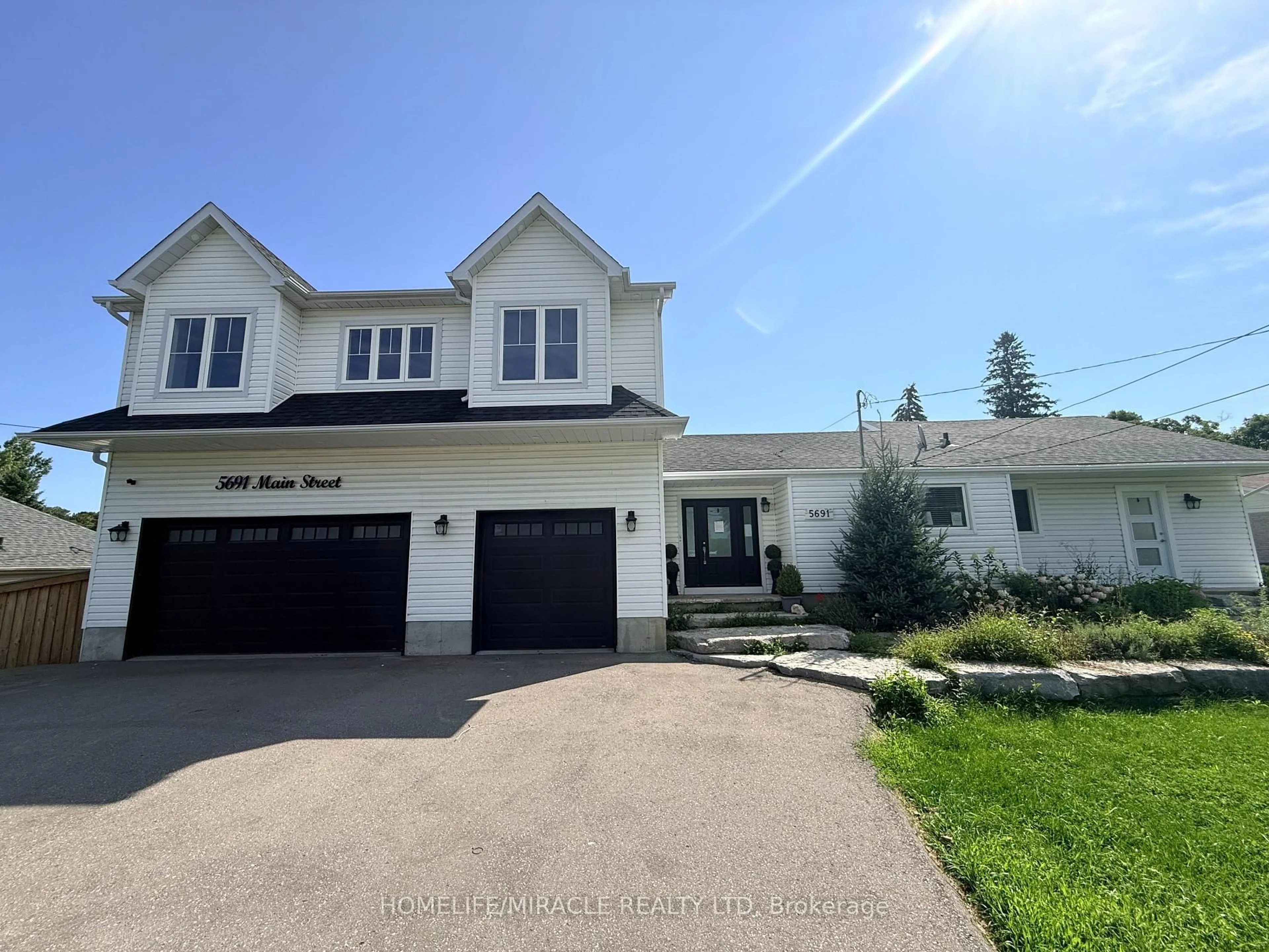 A pic from outside/outdoor area/front of a property/back of a property/a pic from drone, street for 5691 Main St, Clarington Ontario L0B 1M0