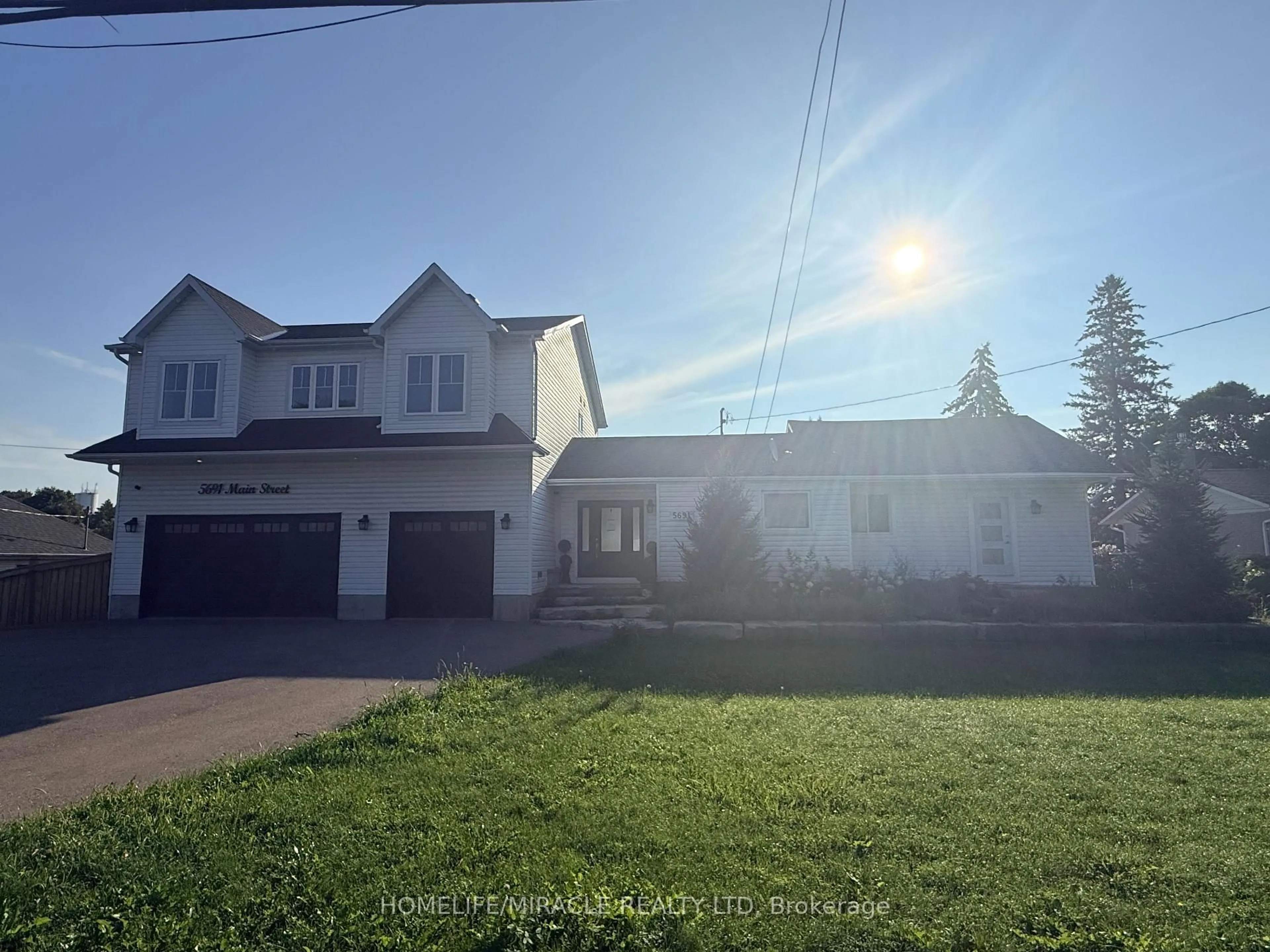 A pic from outside/outdoor area/front of a property/back of a property/a pic from drone, street for 5691 Main St, Clarington Ontario L0B 1M0