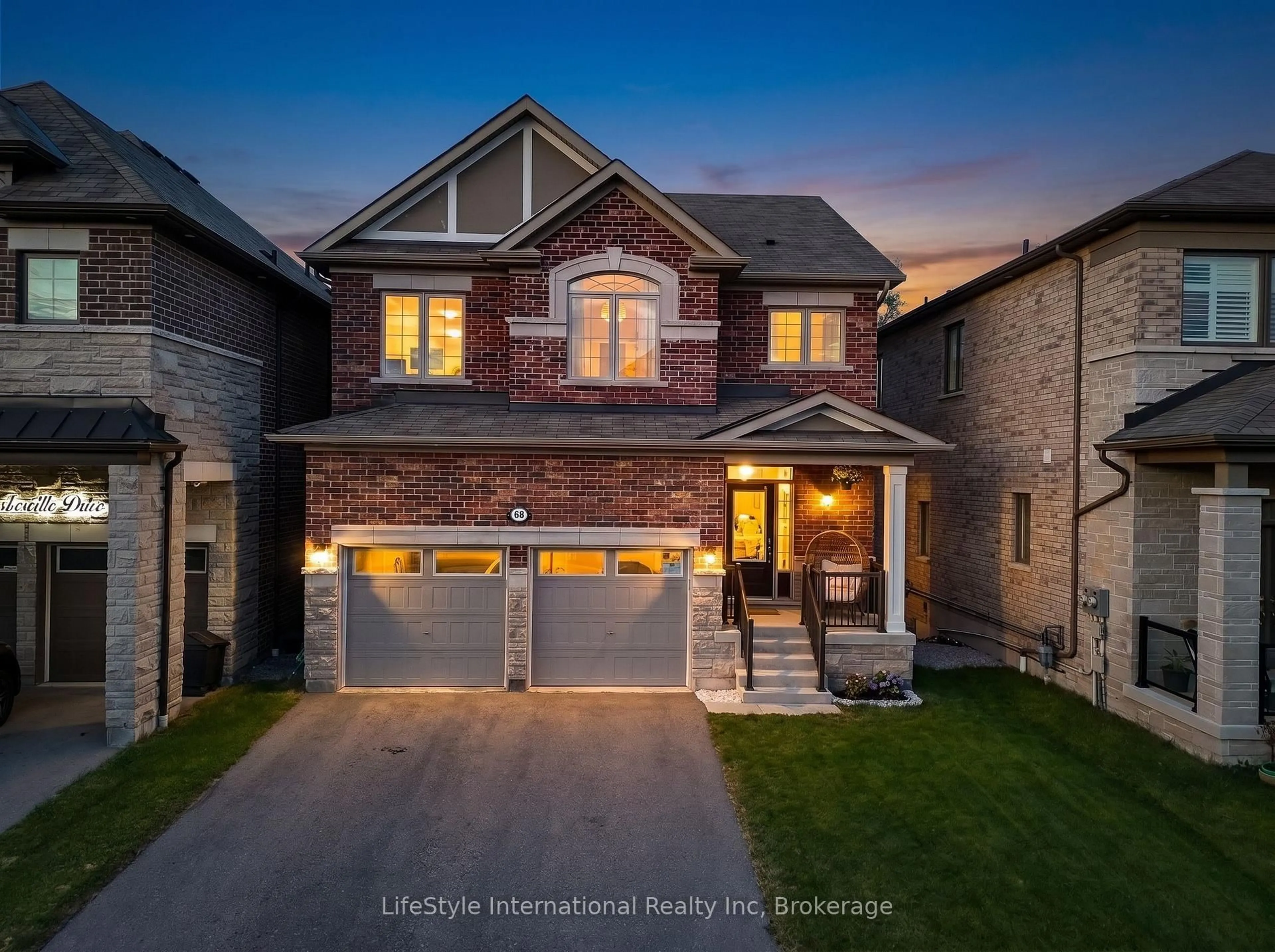 Home with brick exterior material, street for 68 Barkerville Dr, Whitby Ontario L1P 0L8