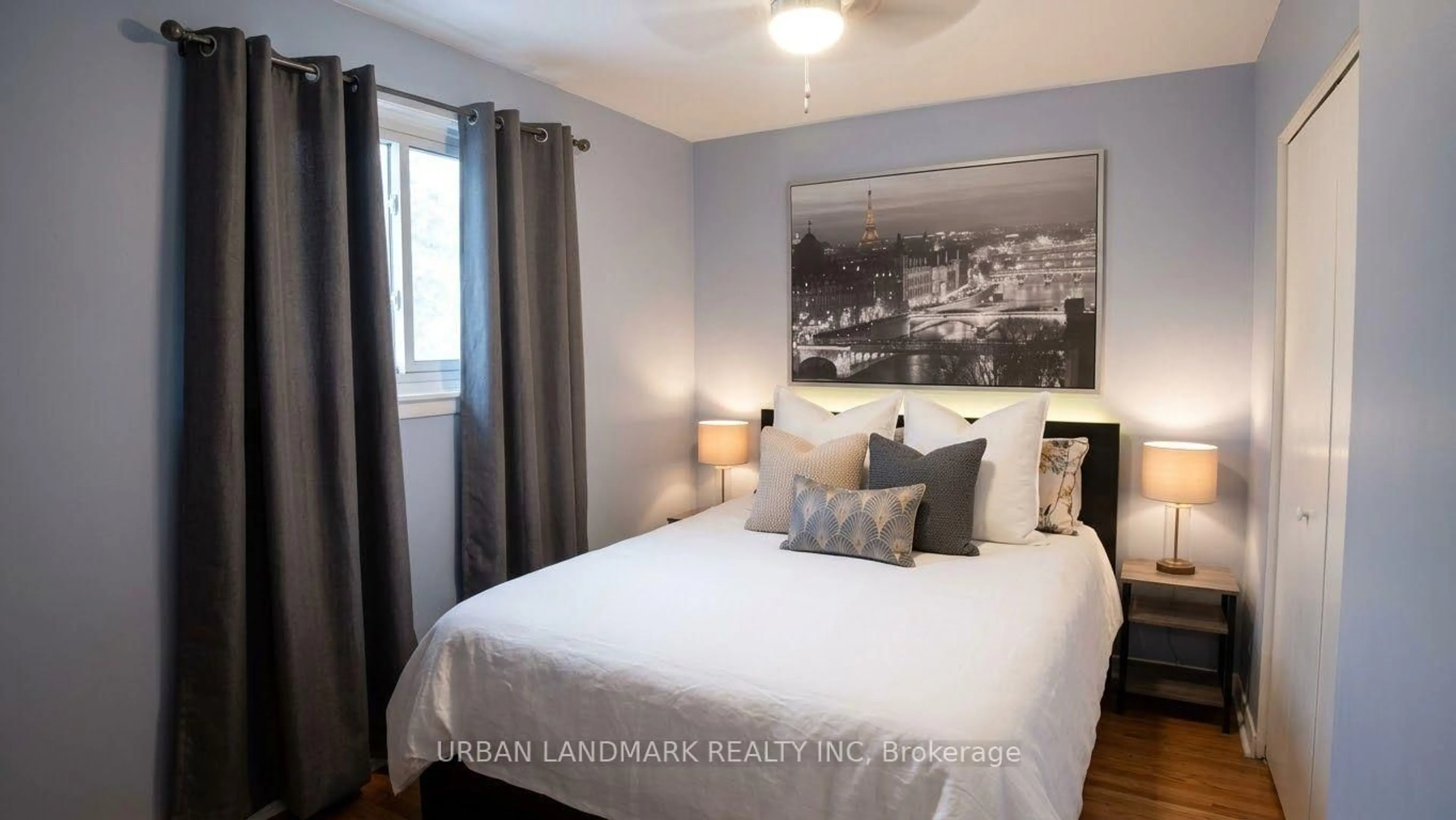 Bedroom with bed, wood/laminate floor for 329 Durham Crt, Oshawa Ontario L1J 1W8