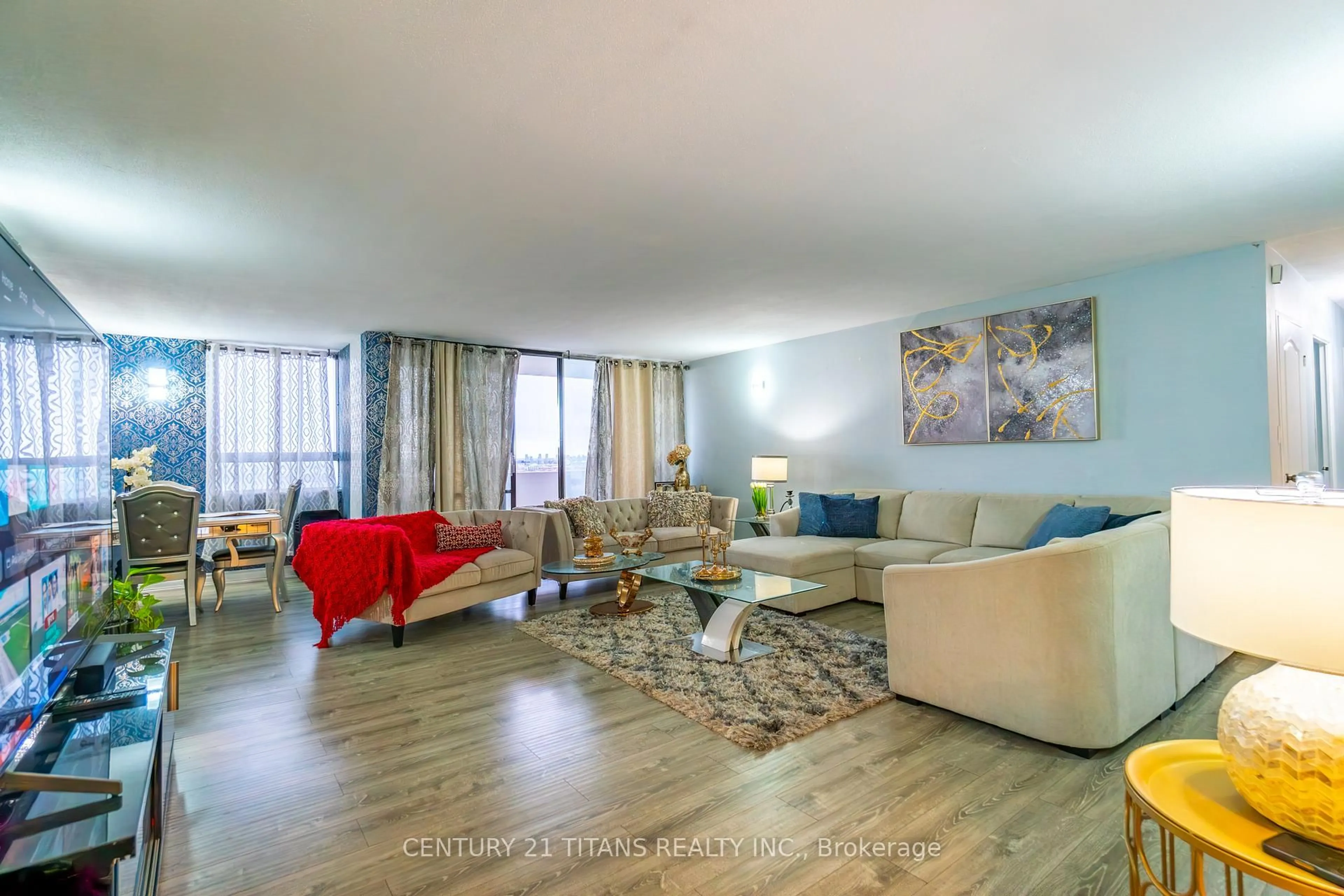 Living room with furniture, wood/laminate floor for 3 Massey Sq #3001, Toronto Ontario M4C 5L5